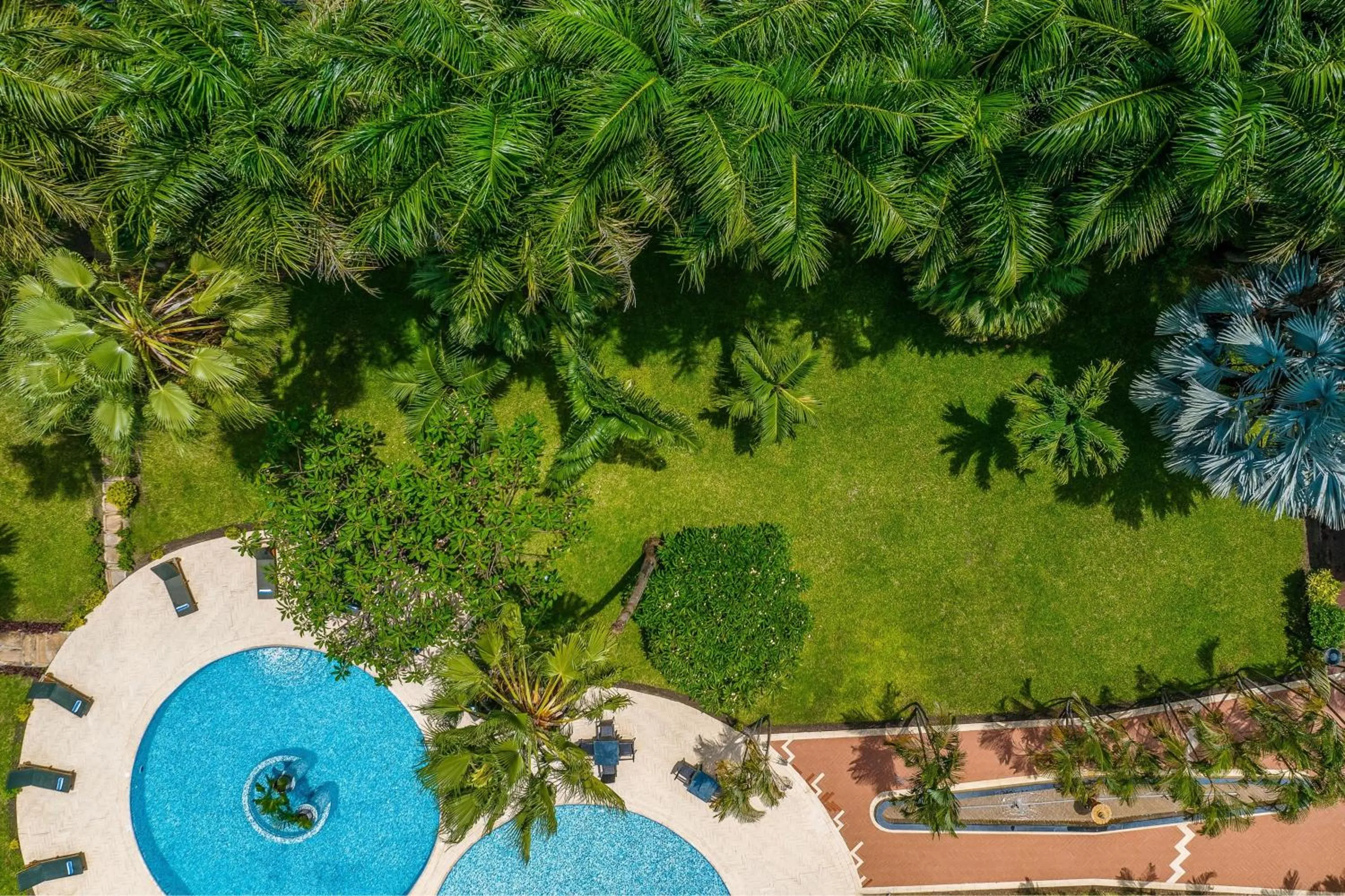 Swimming pool in Delta Hotels by Marriott Dar es Salaam