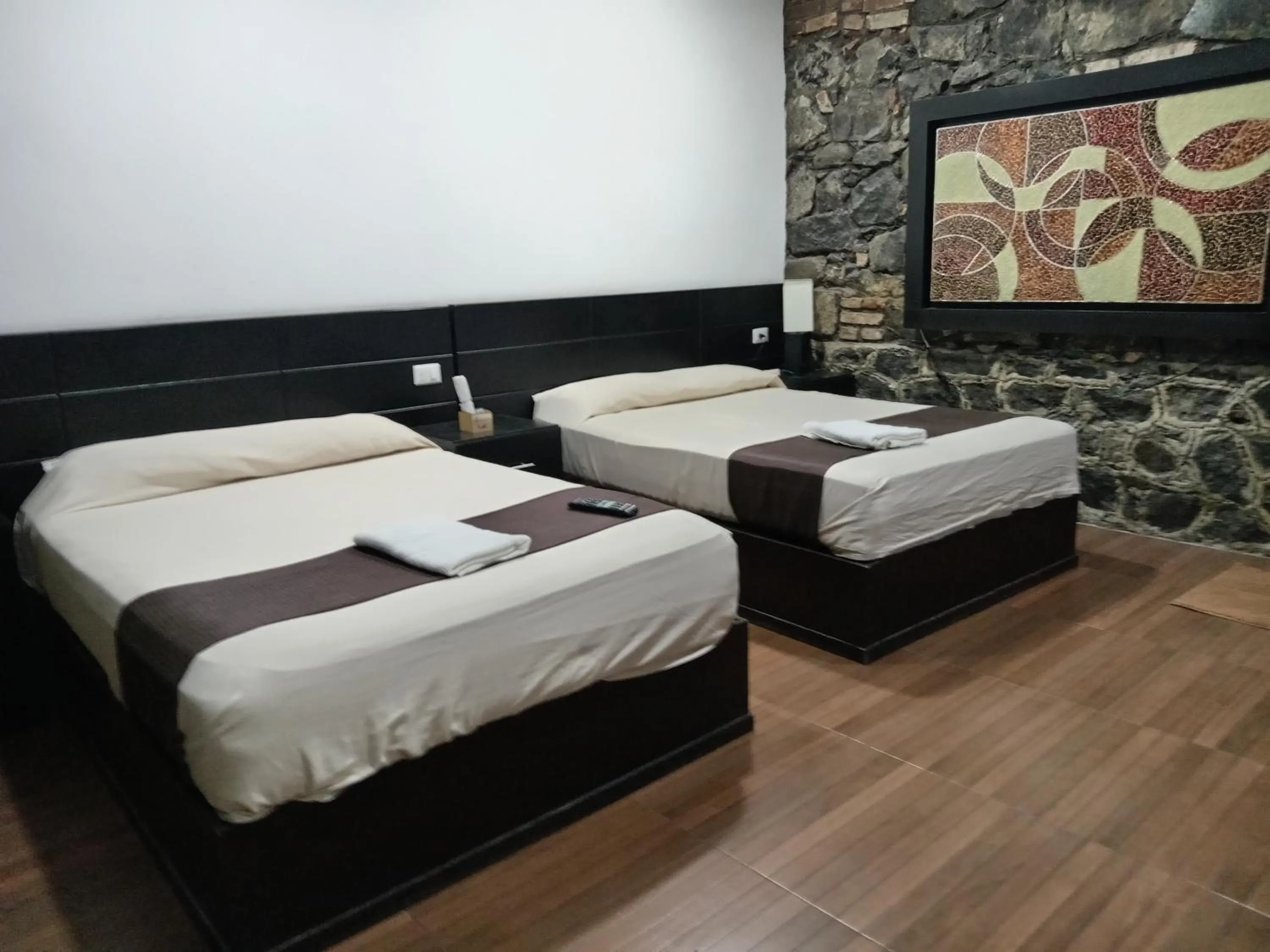 Property building, Bed in Hotel Xochicaltzin