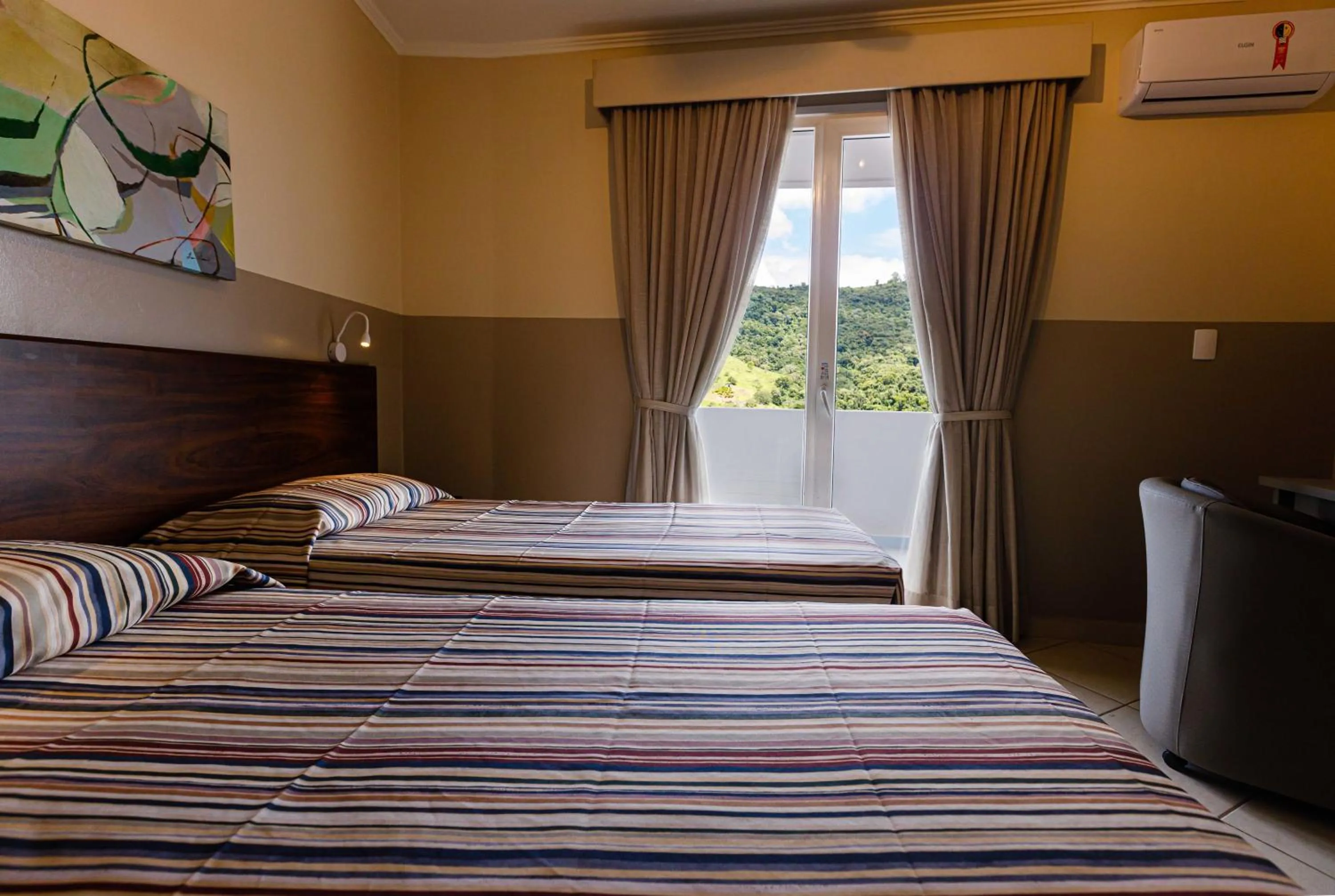 Bed in Panorama Hotel & Spa