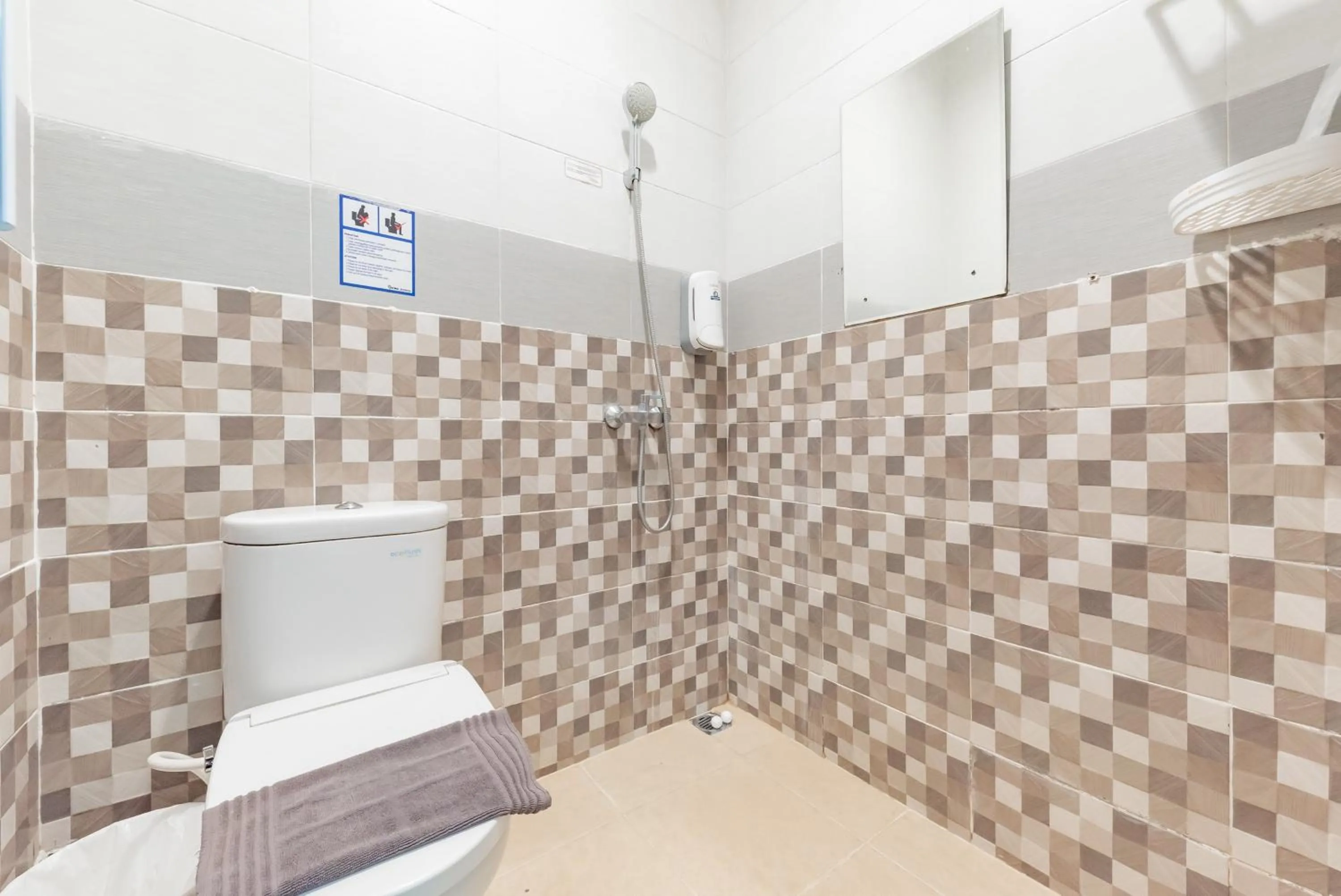 Bathroom in Urbanview Darmo Residence Bandung