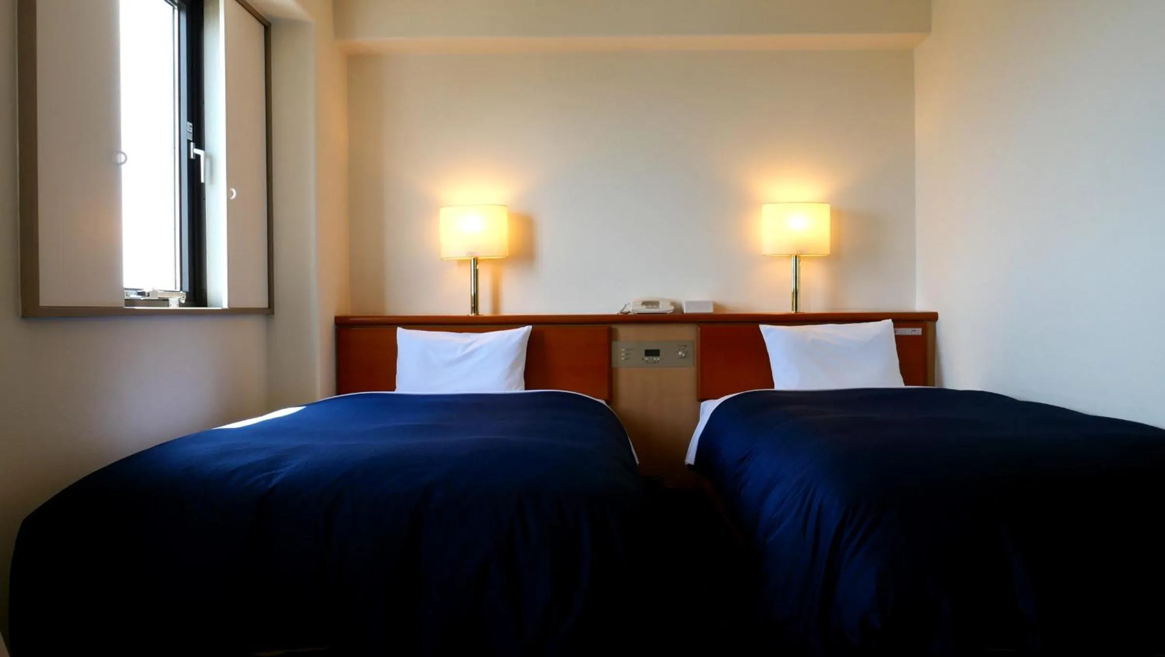 Bed in Tourist Hotel Hitachi