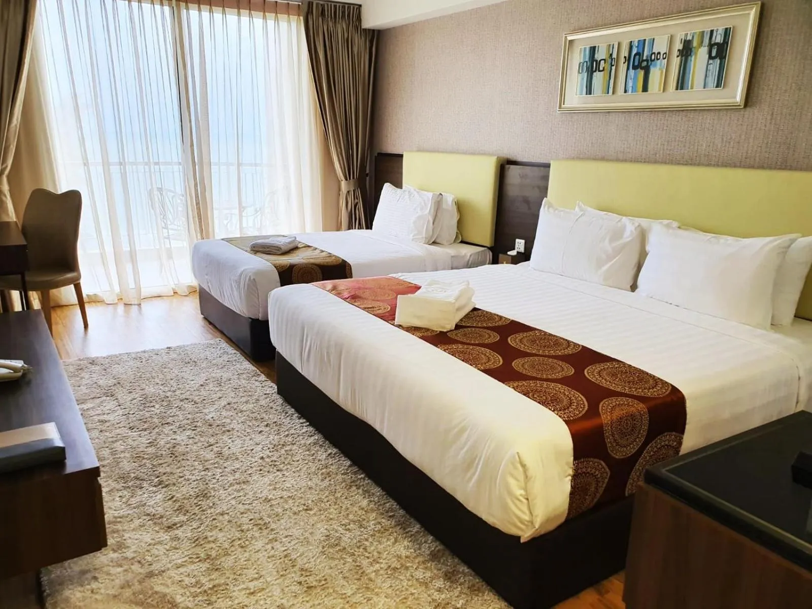 Bed in AMERALD RESORT HOTEL DESARU