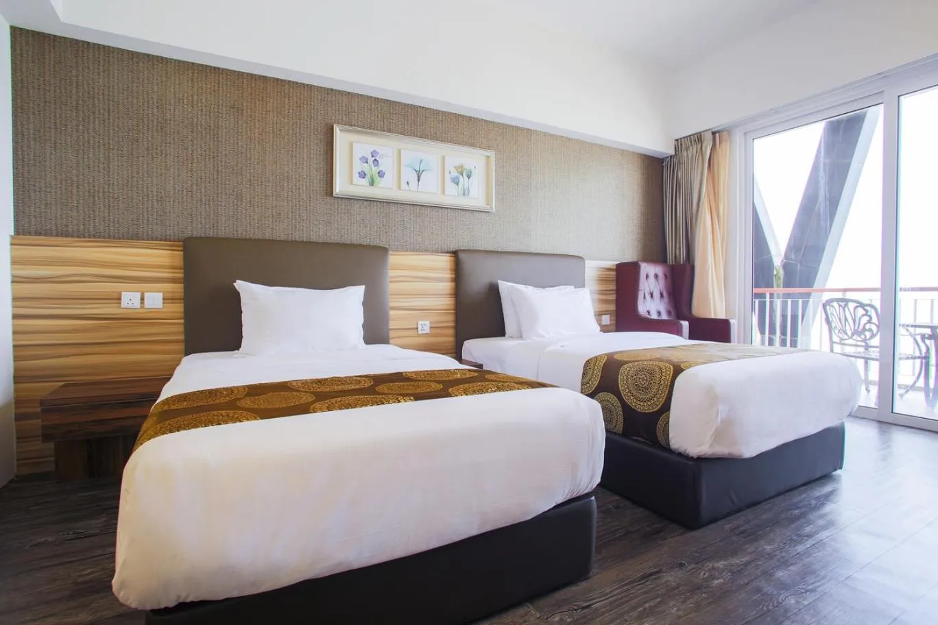 Bed in AMERALD RESORT HOTEL DESARU