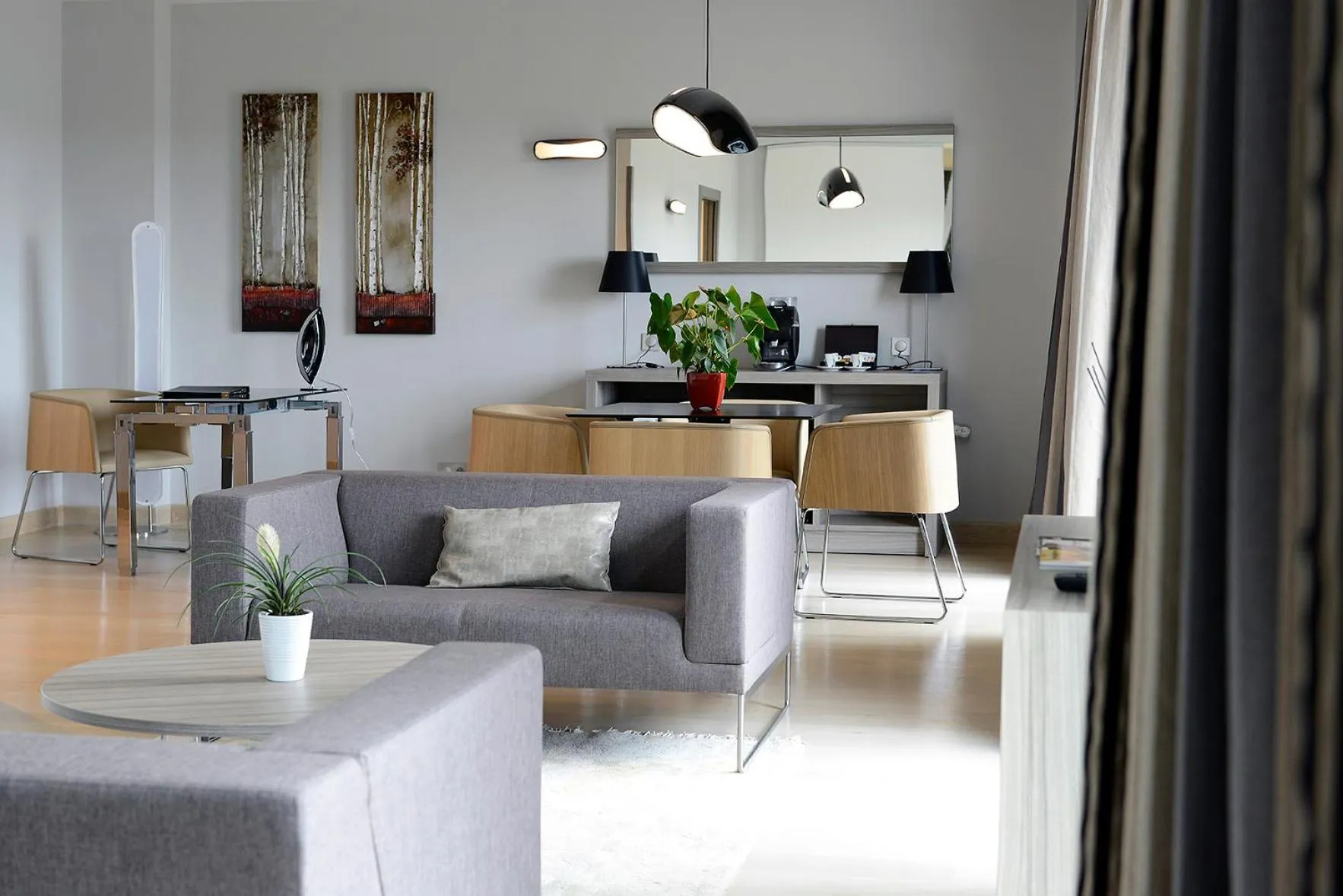 Living room in Kyriad Prestige Lyon Est - Saint Priest Eurexpo Hotel and SPA