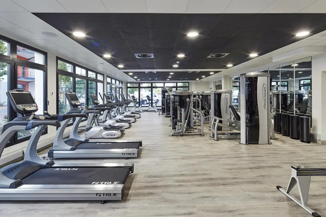 Fitness centre/facilities in Kyriad Prestige Lyon Est - Saint Priest Eurexpo Hotel and SPA Fitness centre/facilities in Kyriad Prestige Lyon Est - Saint Priest Eurexpo Hotel and SPA
