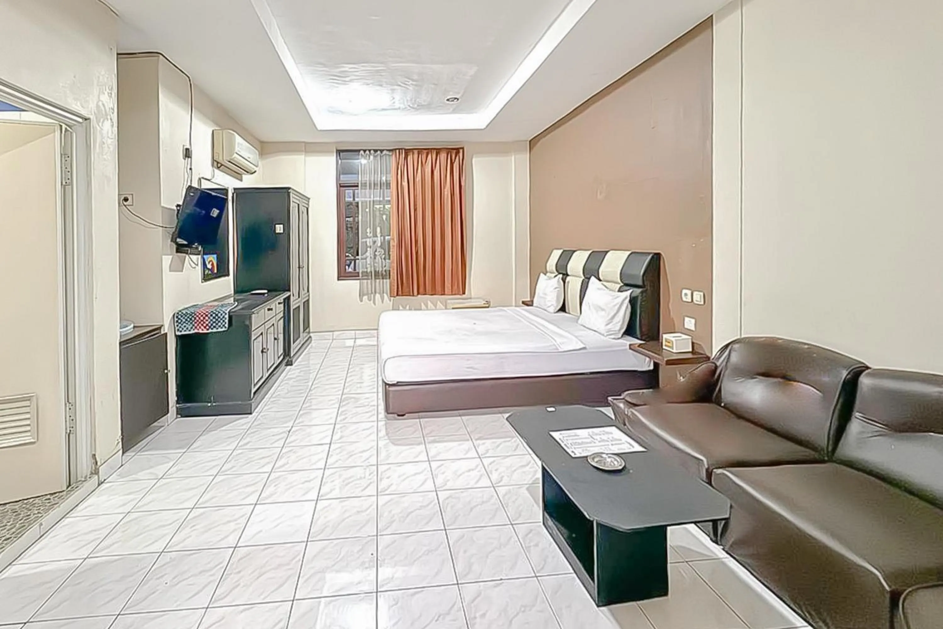 Bedroom, Bed in Fajar Indah Hotel Mitra RedDoorz