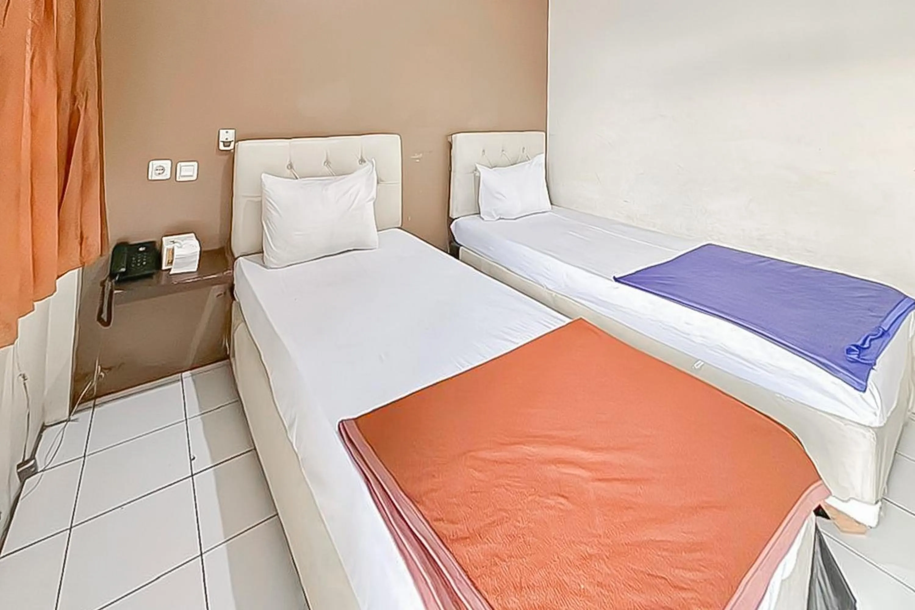 Bedroom, Bed in Fajar Indah Hotel Mitra RedDoorz