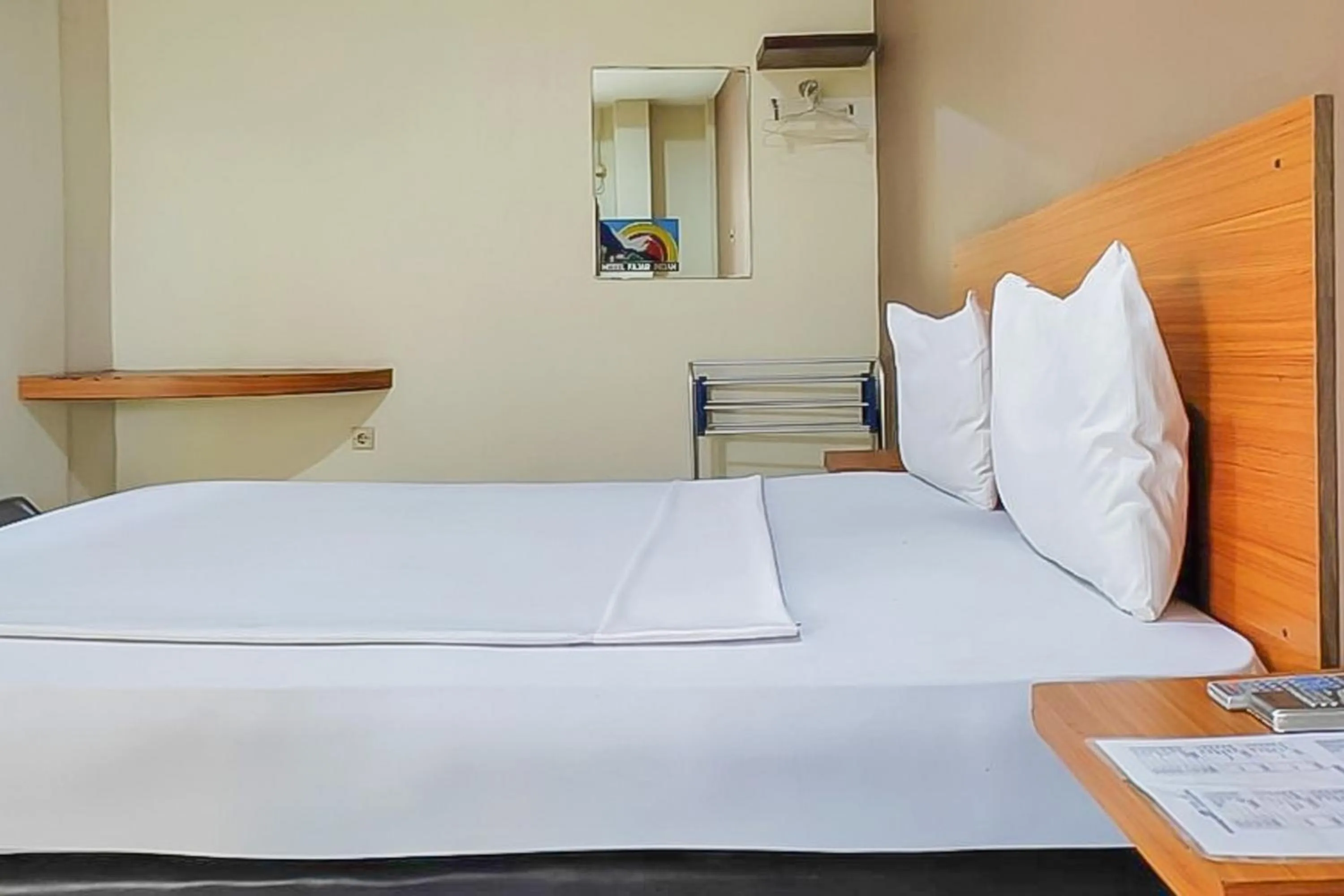 Bedroom, Bed in Fajar Indah Hotel Mitra RedDoorz