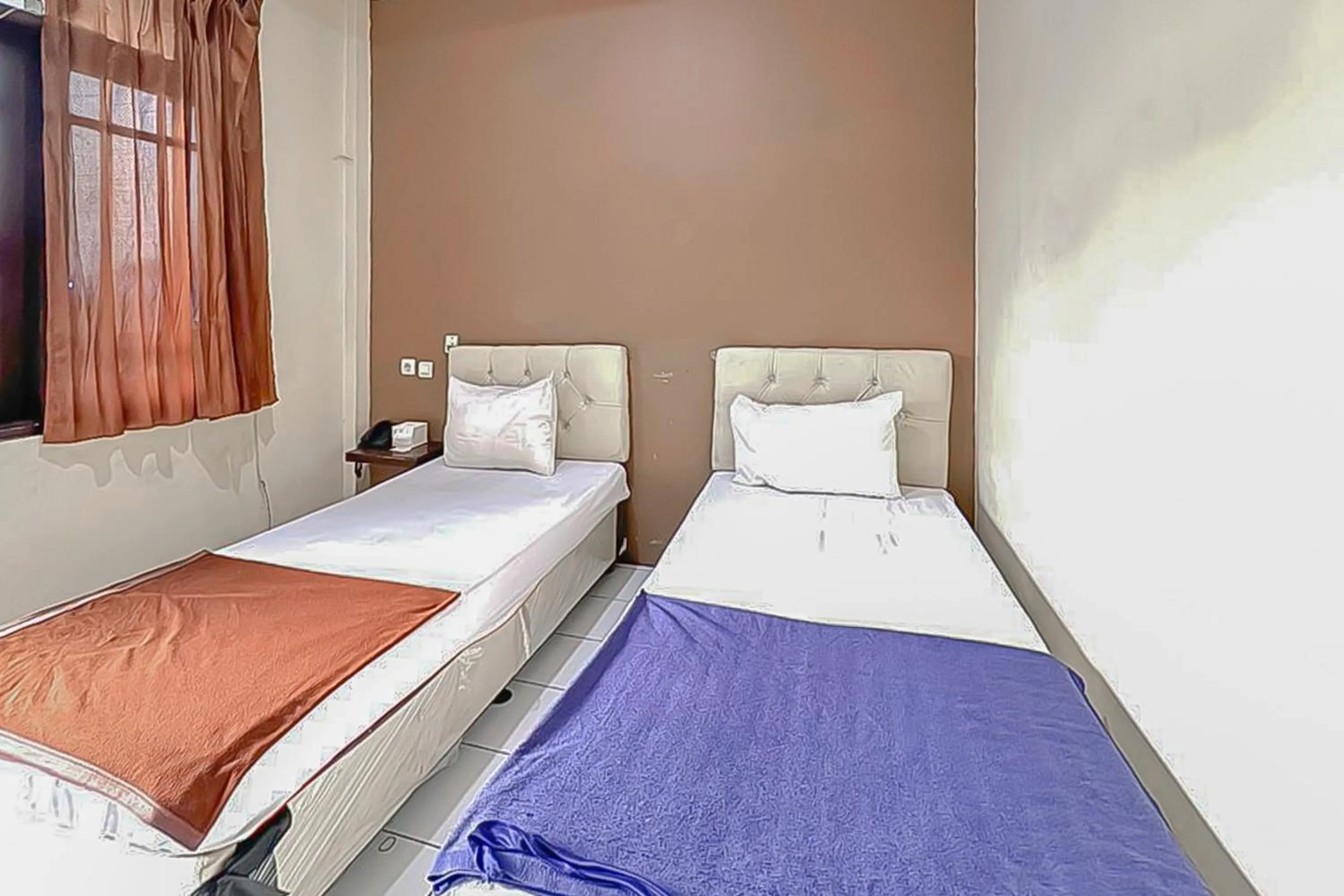 Bedroom, Bed in Fajar Indah Hotel Mitra RedDoorz
