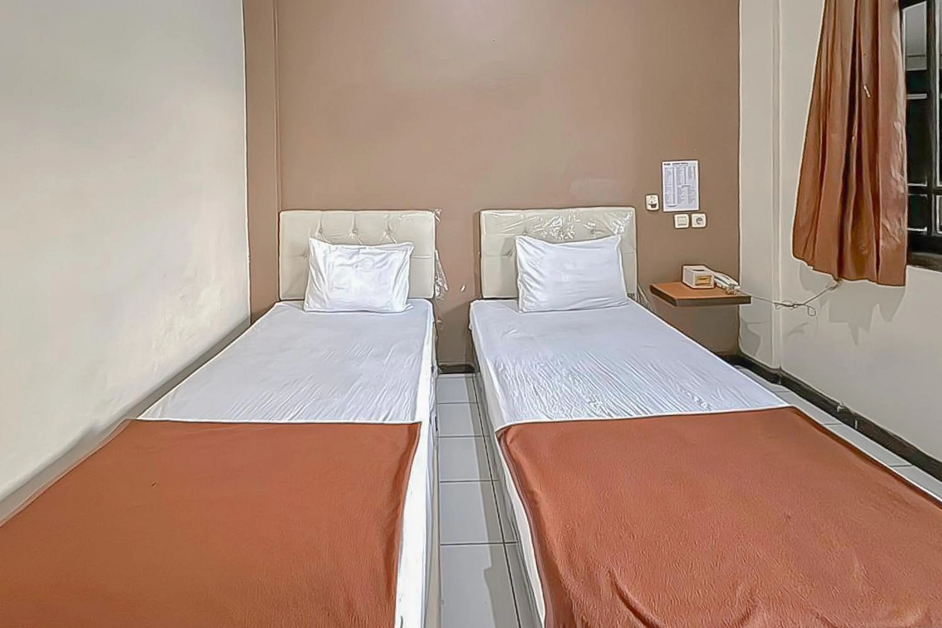 Bedroom, Bed in Fajar Indah Hotel Mitra RedDoorz
