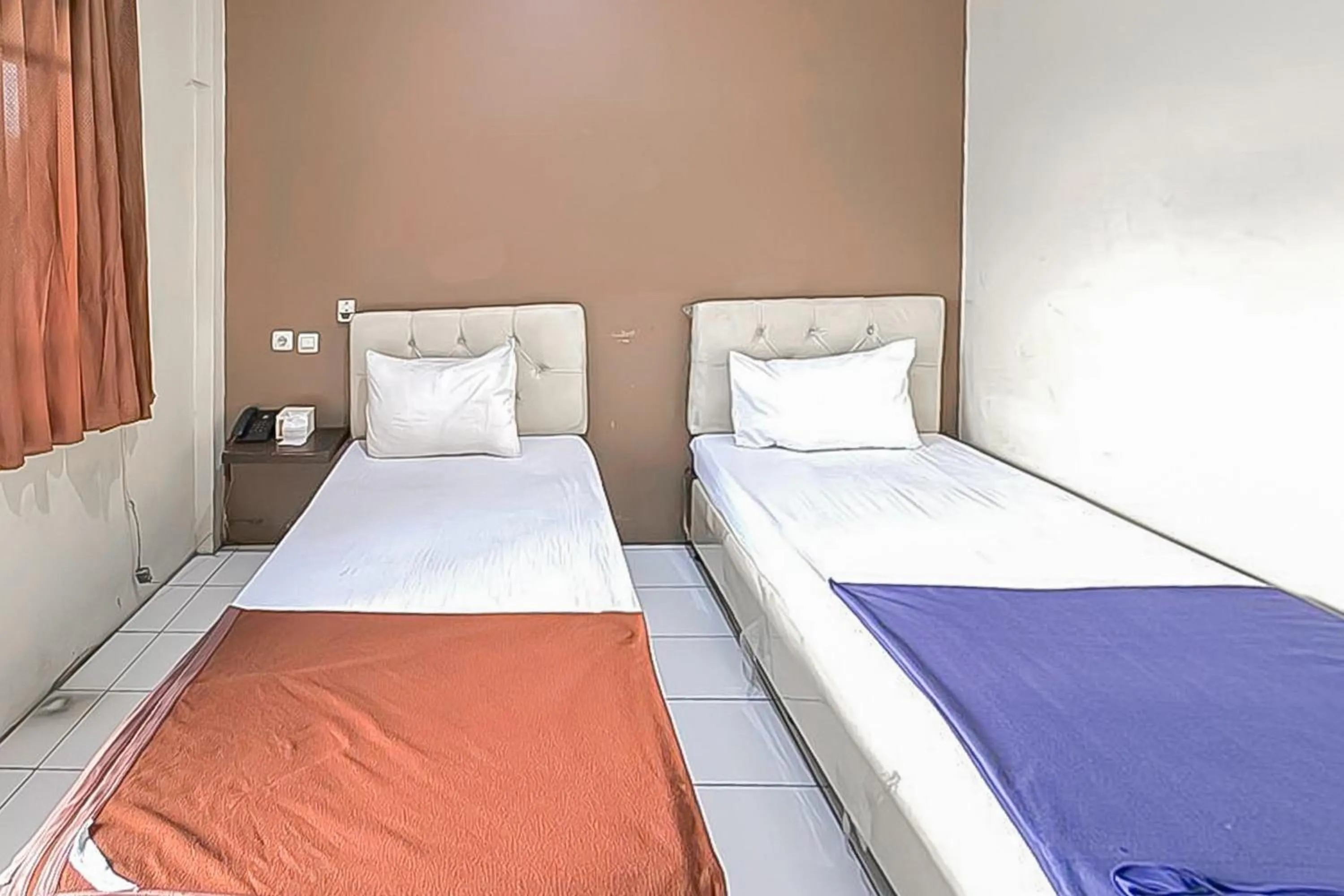 Bedroom, Bed in Fajar Indah Hotel Mitra RedDoorz
