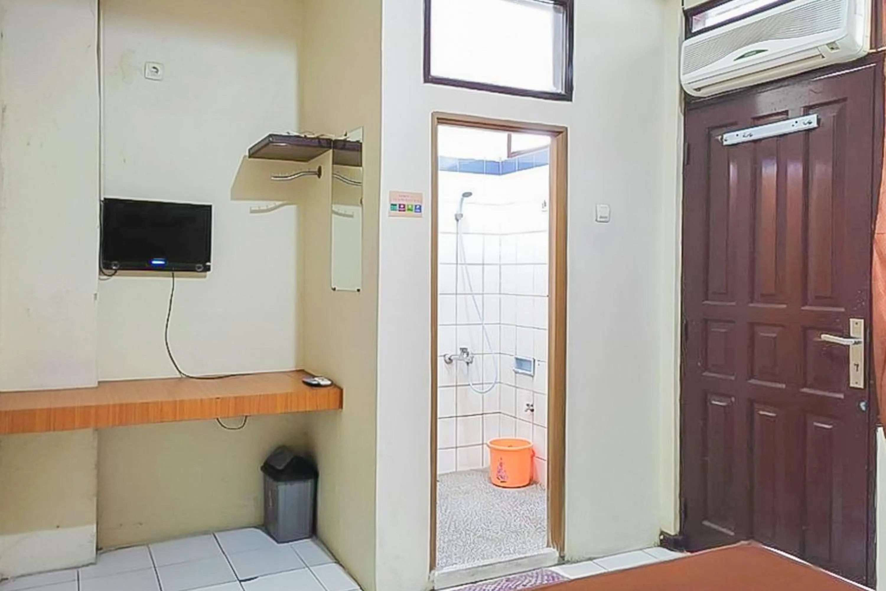 Bedroom in Fajar Indah Hotel Mitra RedDoorz