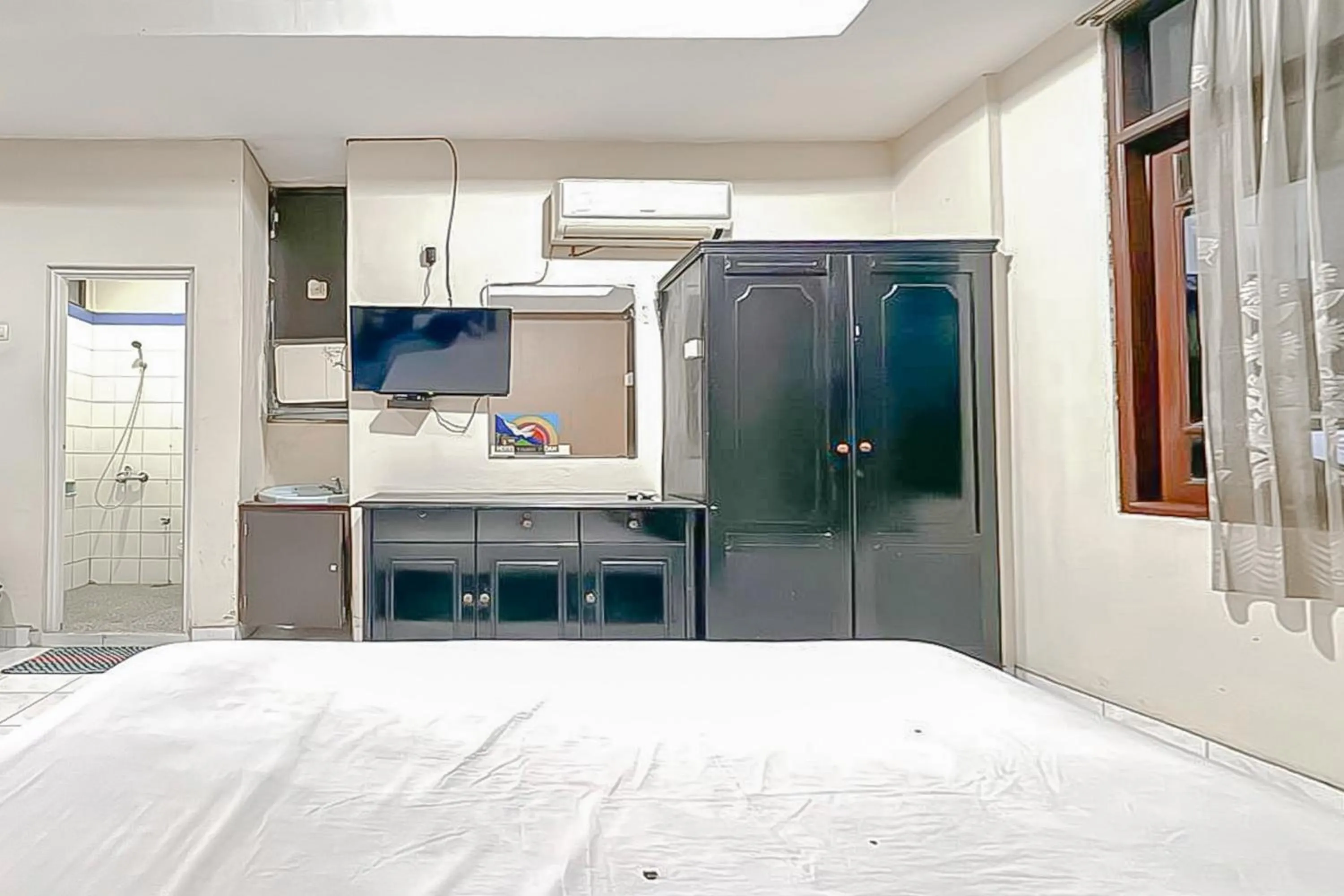 Bedroom, Bed in Fajar Indah Hotel Mitra RedDoorz