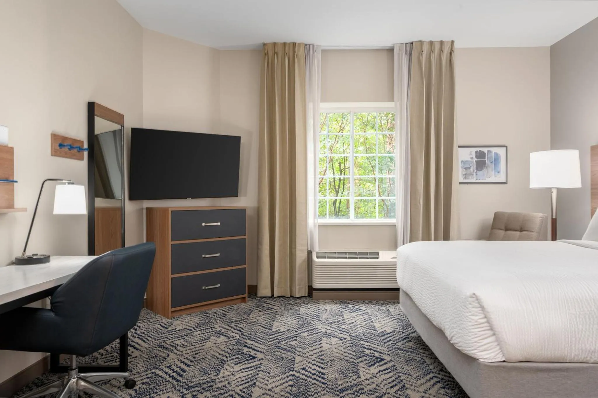 Photo of the whole room, Bed in Candlewood Suites Mooresville Lake Norman,NC by IHG