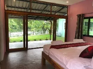 Bed in Kodaun River Kwai Resort