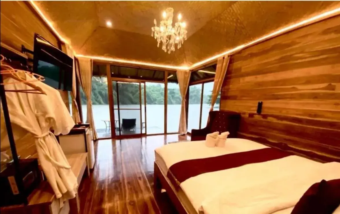 Bed in Kodaun River Kwai Resort Bed in Kodaun River Kwai Resort