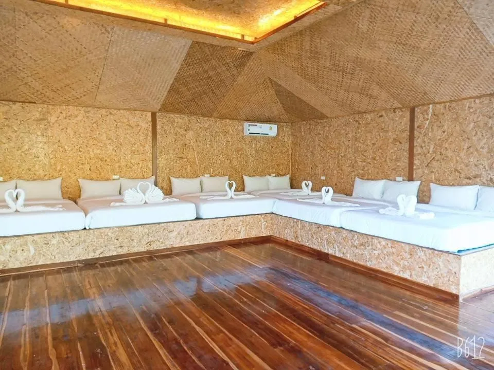 Bed in Kodaun River Kwai Resort