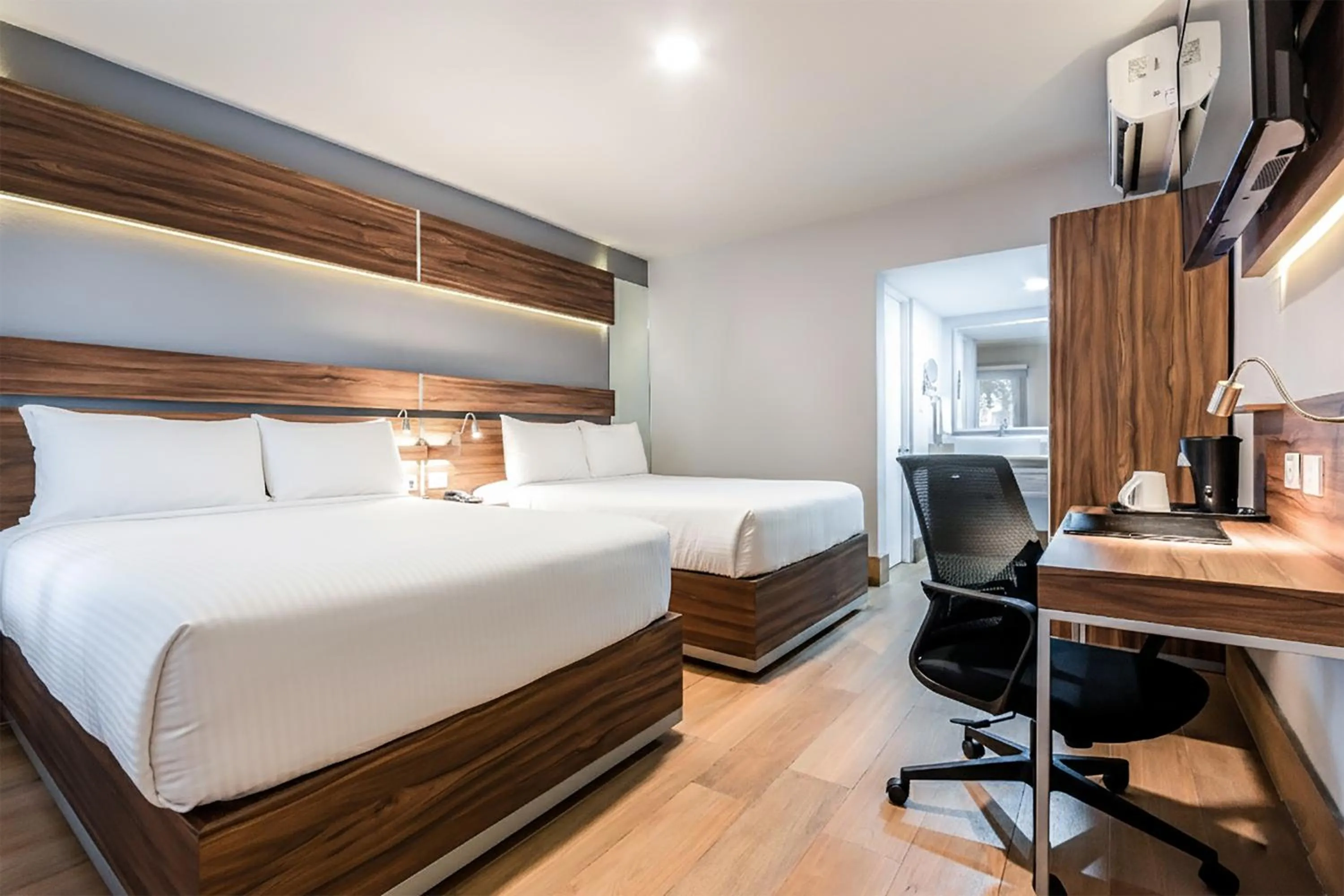 Bed in Sleep Inn Monterrey Norte