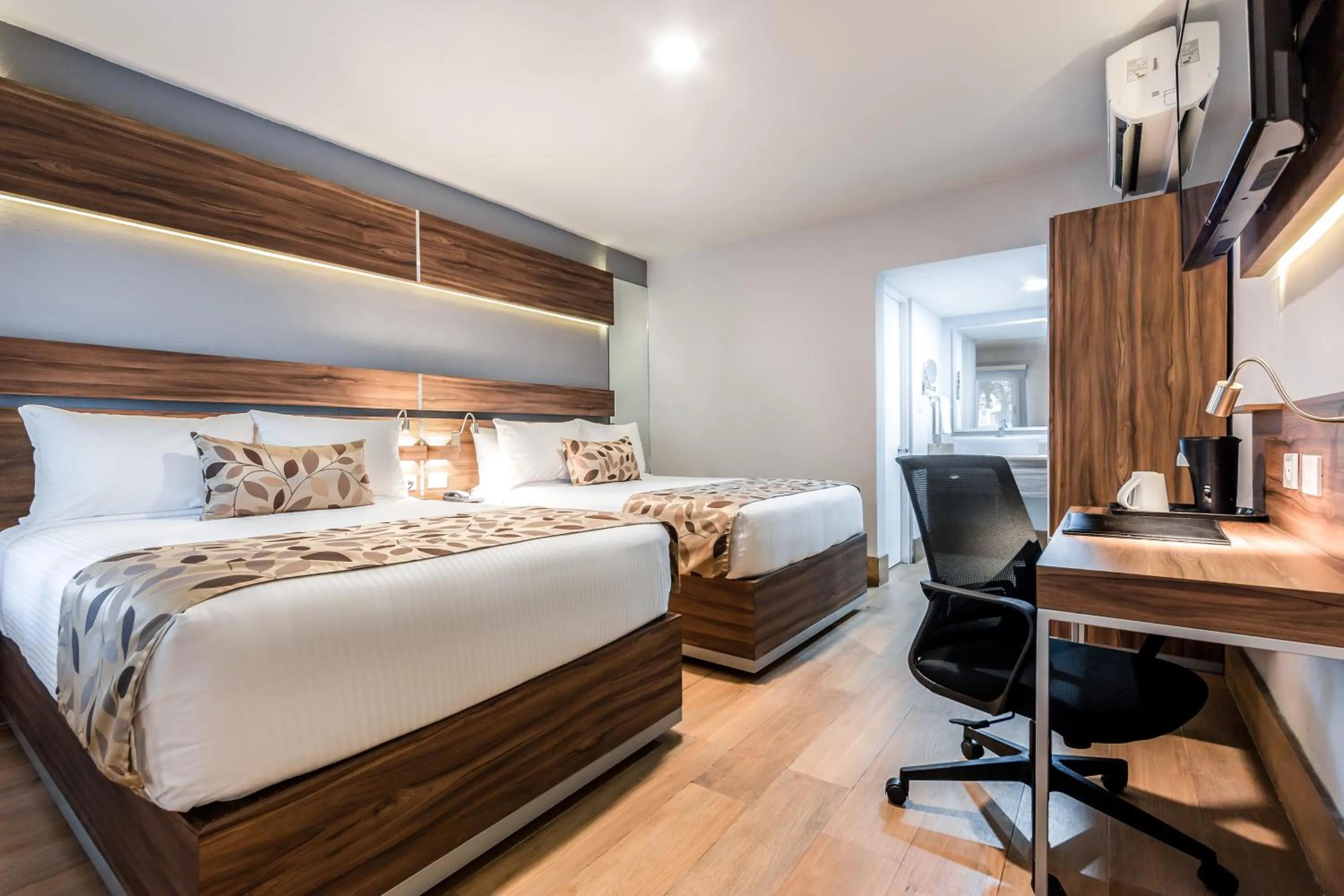 Bed in Sleep Inn Monterrey Norte