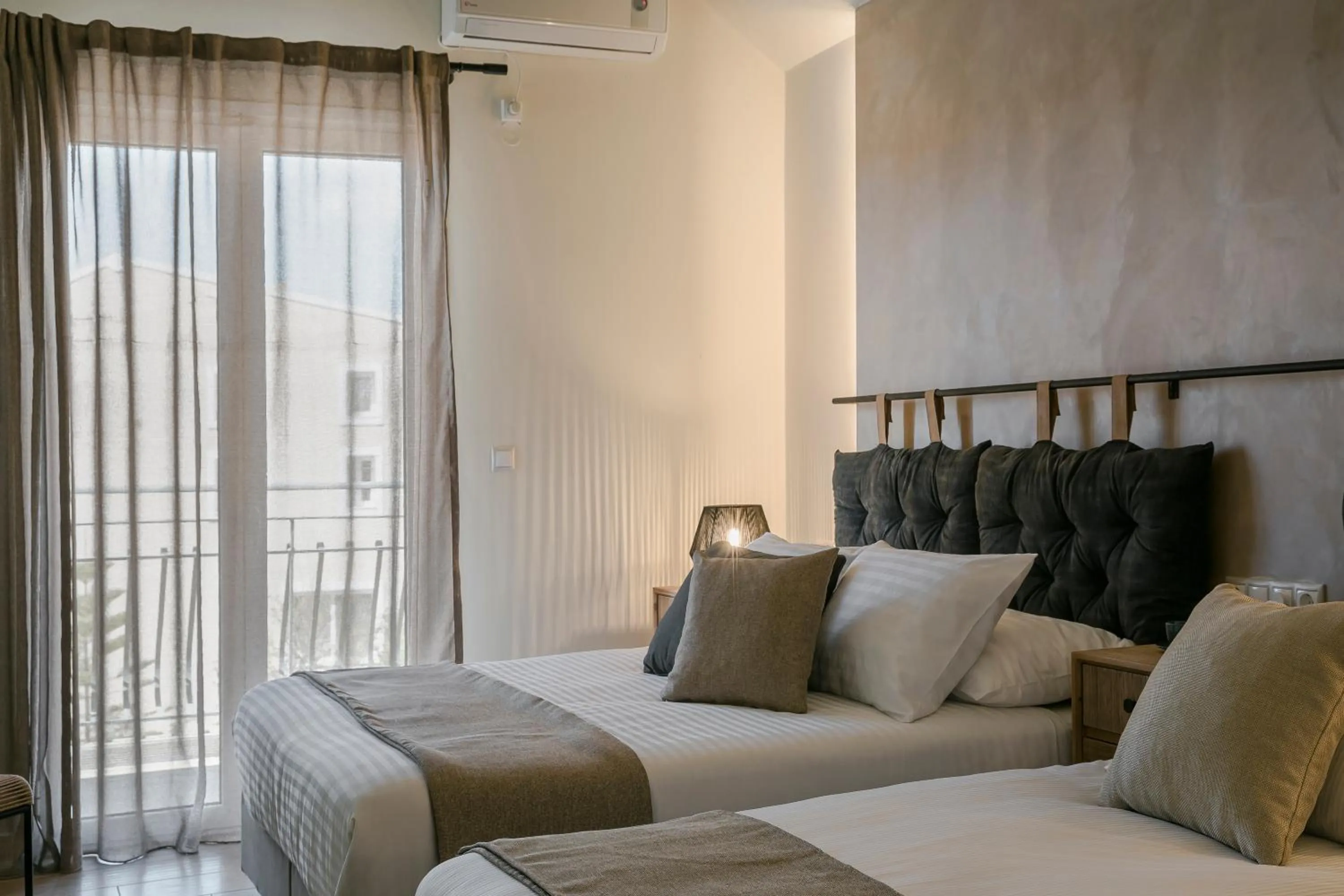 Bed in Socrates Apartments