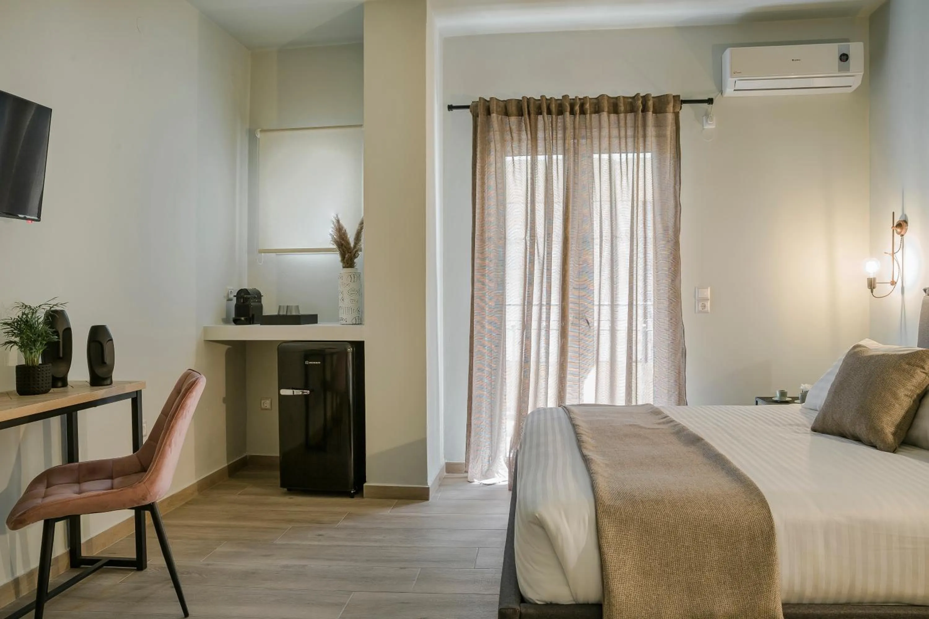 Bed in Socrates Apartments