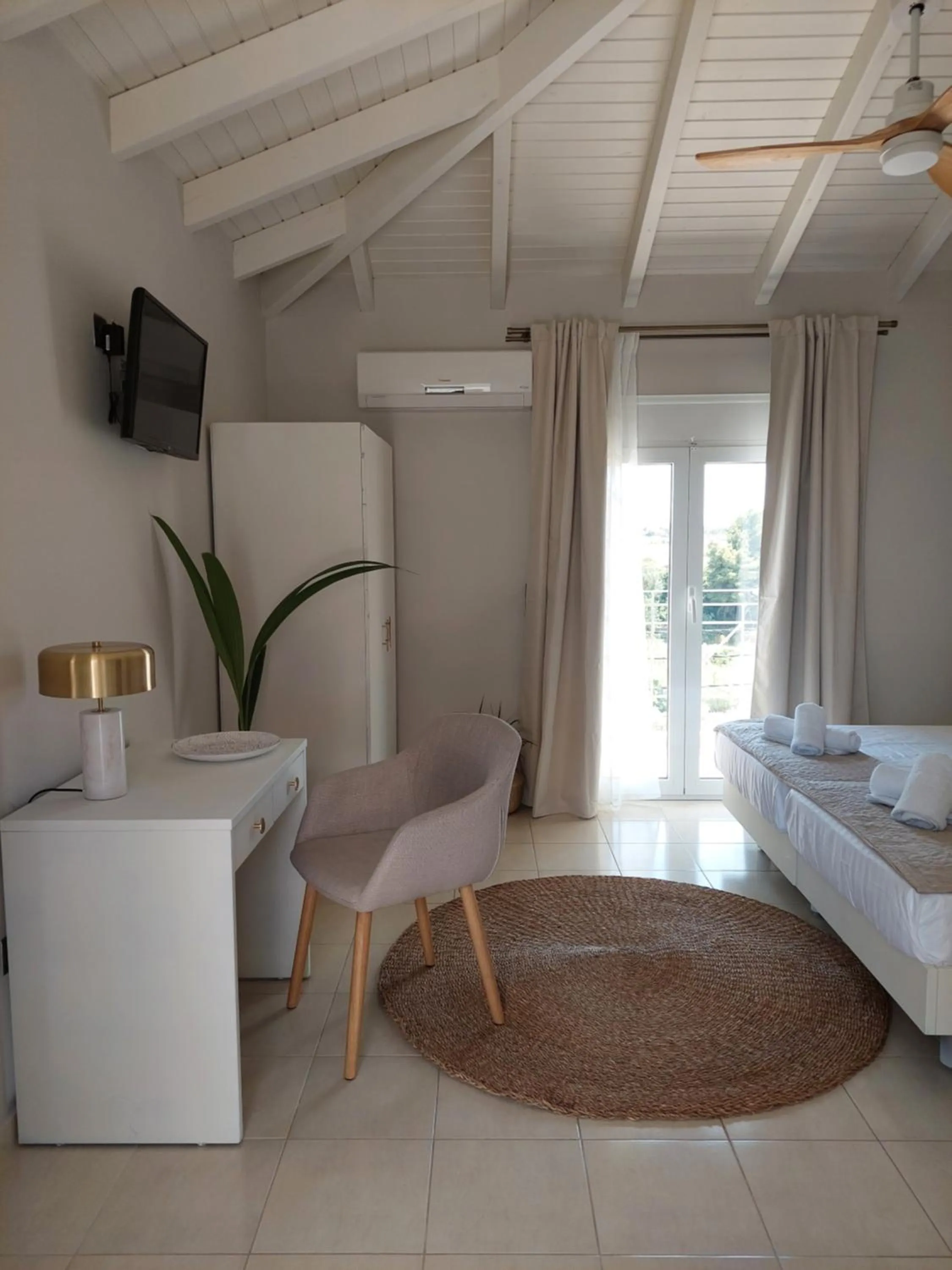 Bed in Socrates Apartments