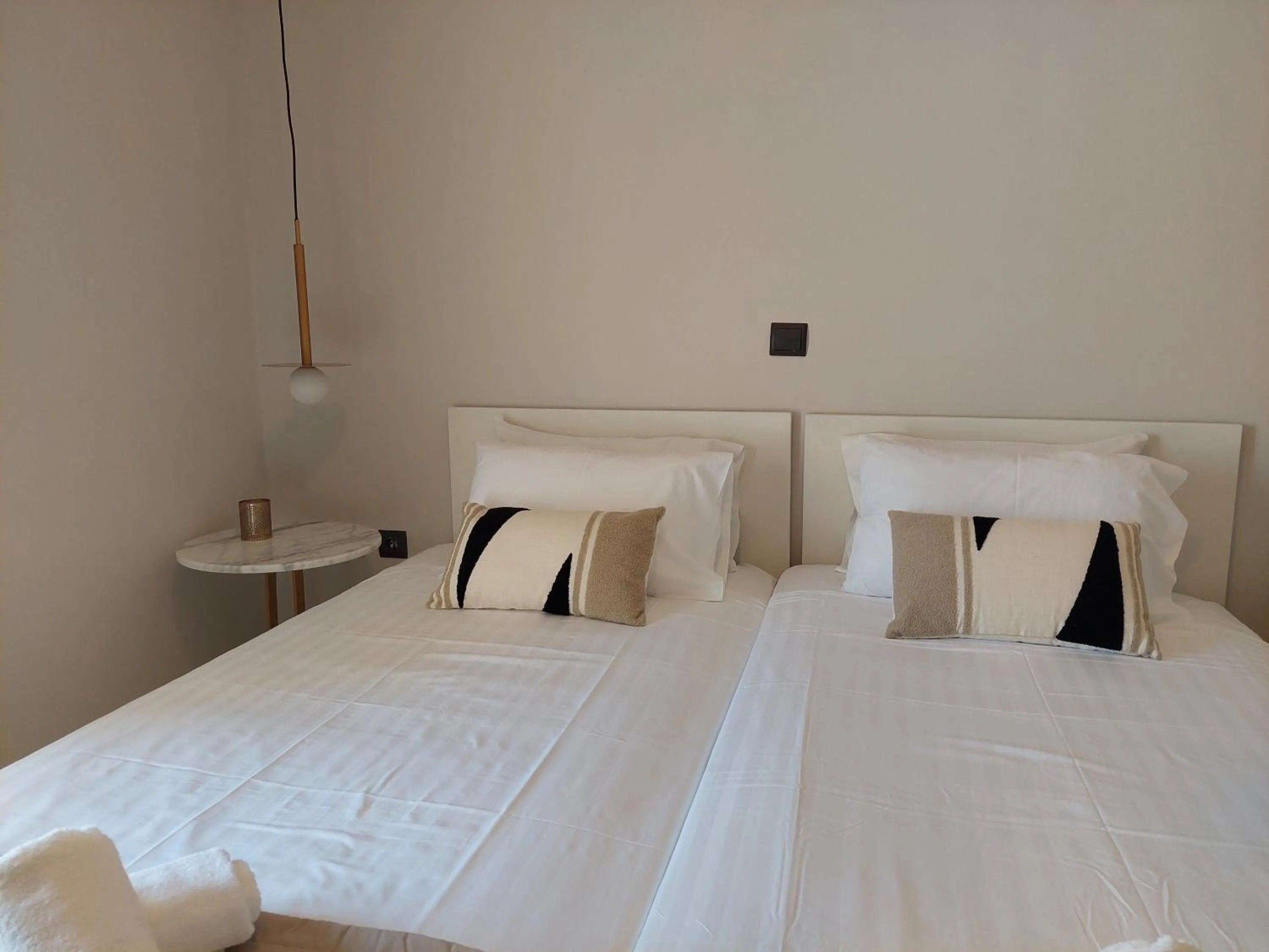 Bed in Socrates Apartments