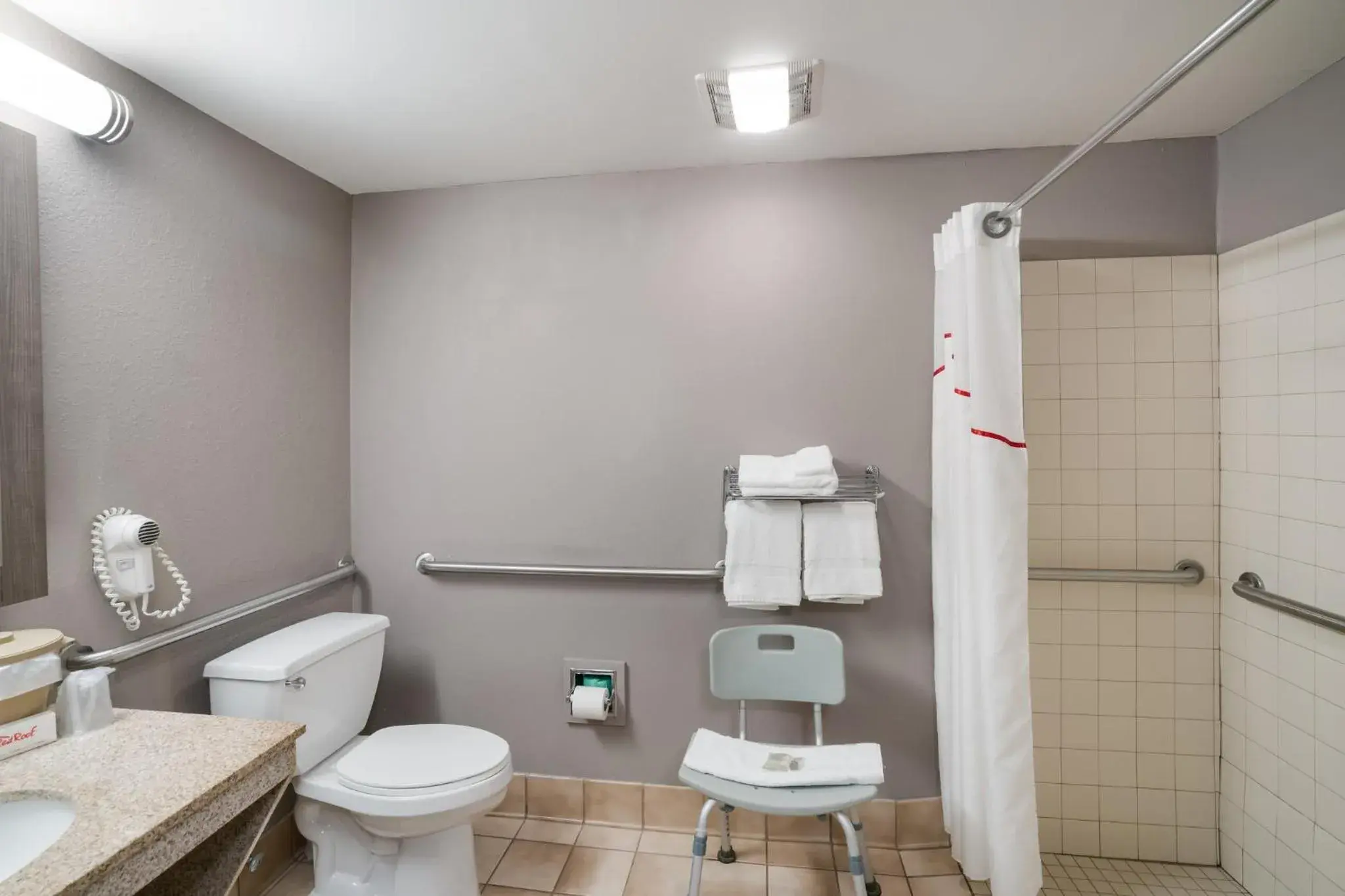 Bathroom in Red Roof Inn & Suites Carrollton, GA - West Georgia Bathroom in Red Roof Inn & Suites Carrollton, GA - West Georgia