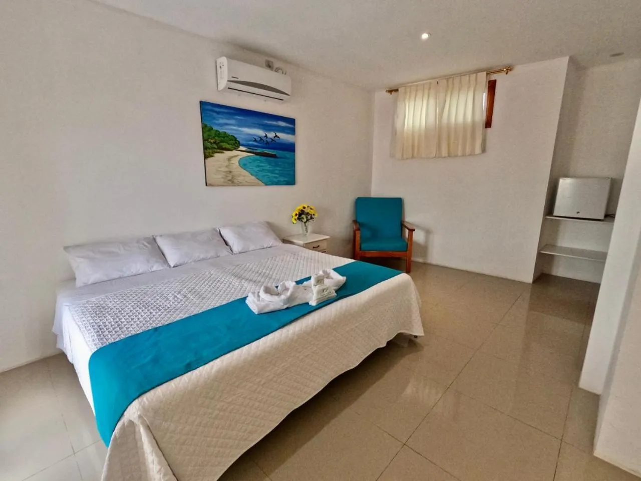 Bed in Galápagos Isabela Hotel Loja