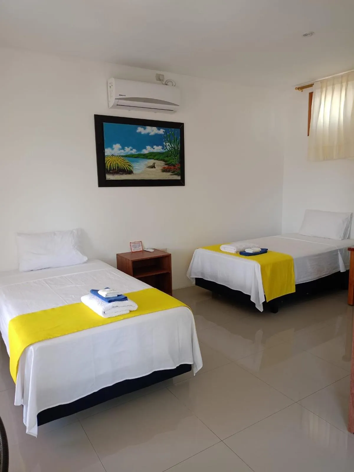 Bed in Galápagos Isabela Hotel Loja