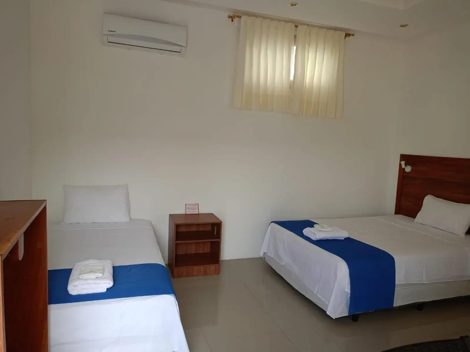 Bedroom, Bed in Galápagos Isabela Hotel Loja Bedroom, Bed in Galápagos Isabela Hotel Loja