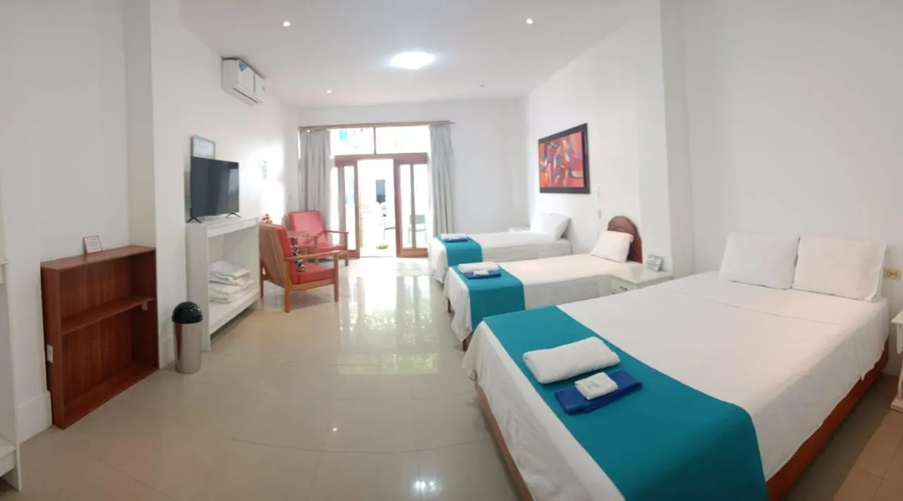 Bed in Galápagos Isabela Hotel Loja