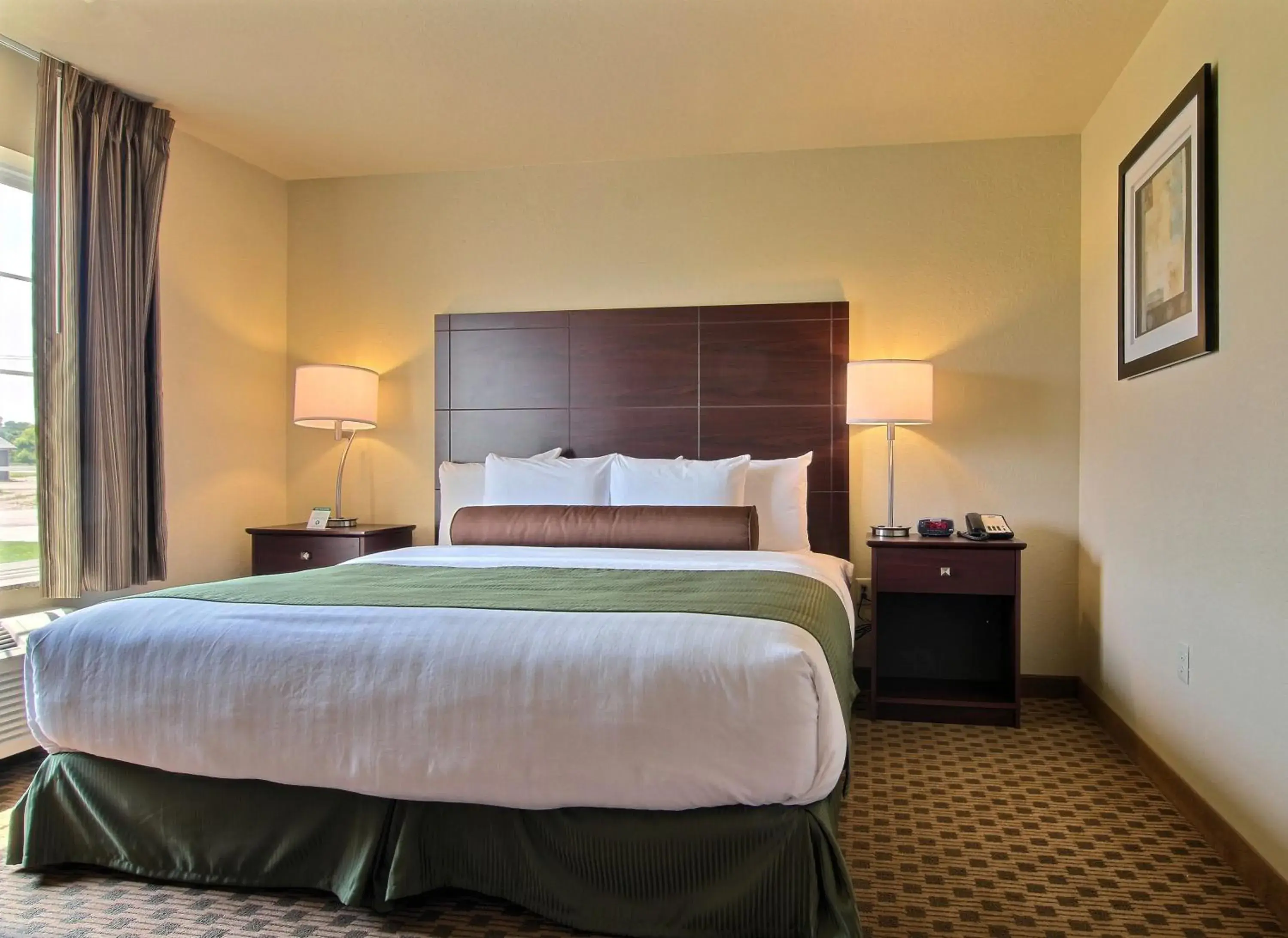 Bedroom, Bed in Cobblestone Inn & Suites - Carrington Bedroom, Bed in Cobblestone Inn & Suites - Carrington