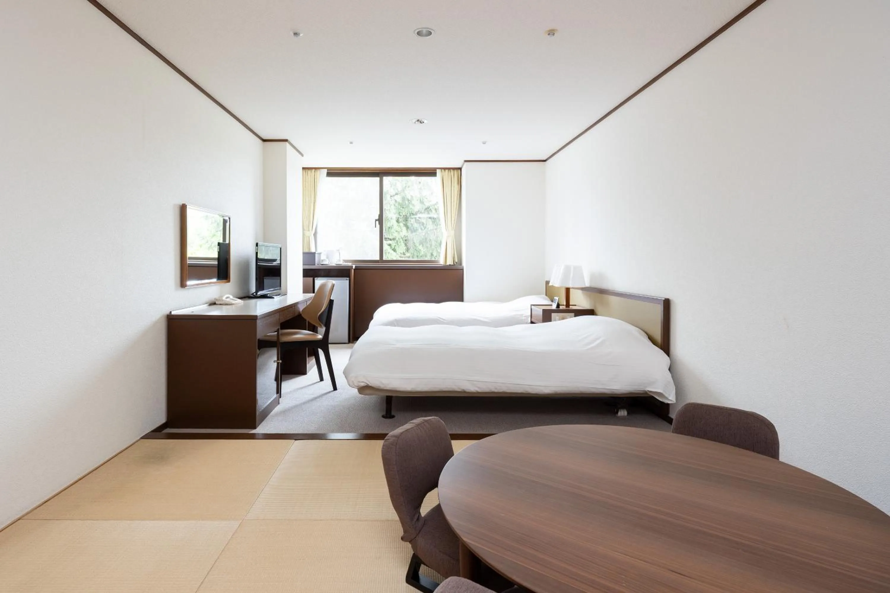 Bed in Hotel Kanronomori