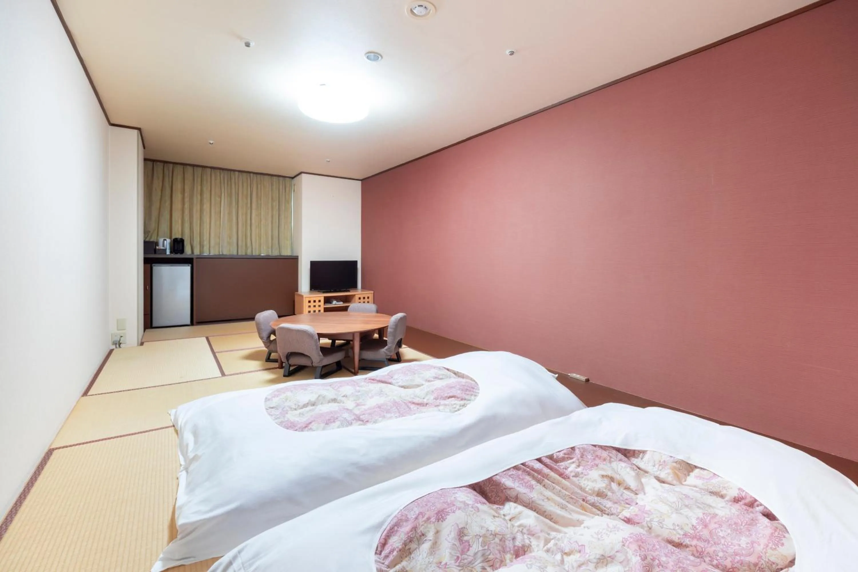 Bed in Hotel Kanronomori