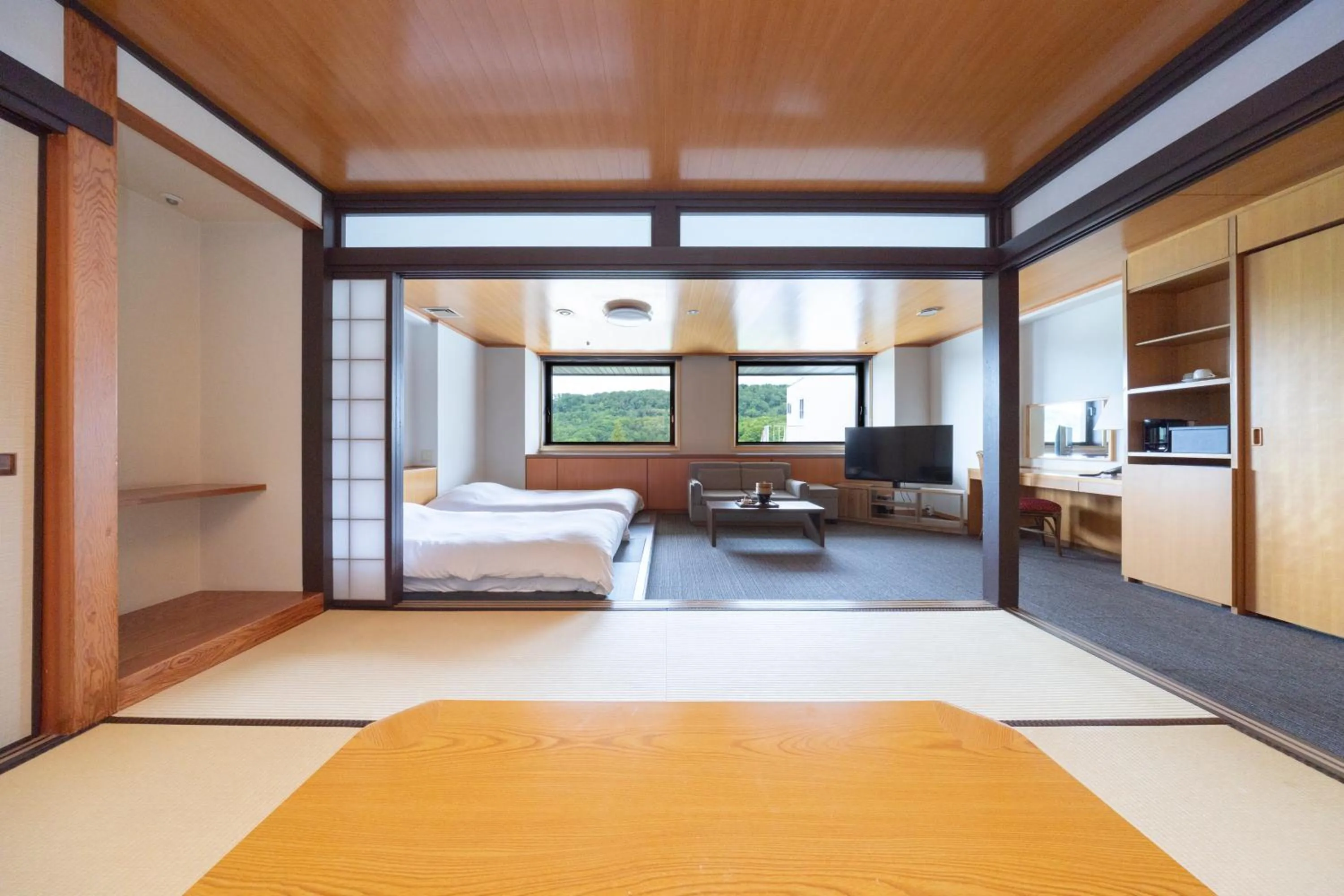 Bed in Hotel Kanronomori