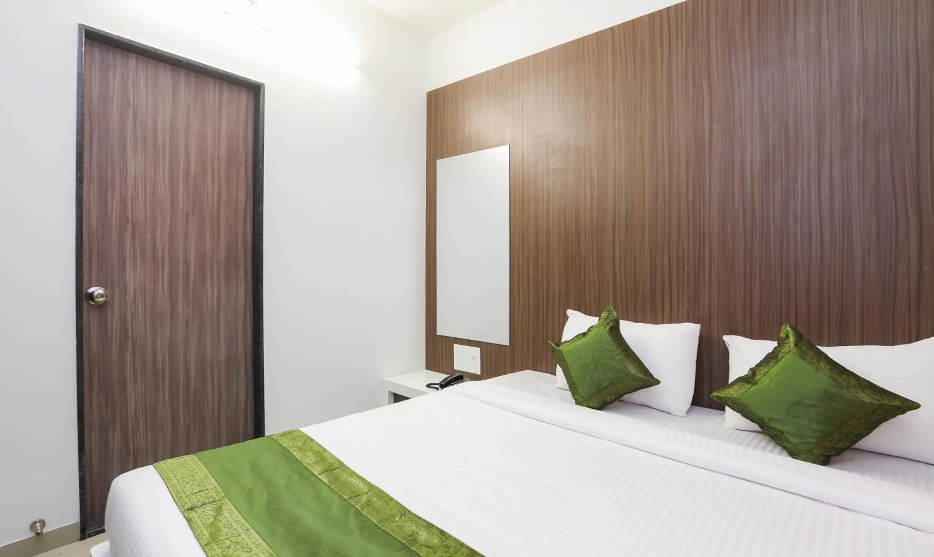 Bedroom, Bed in Treebo Sapphire Studio Bedroom, Bed in Treebo Sapphire Studio