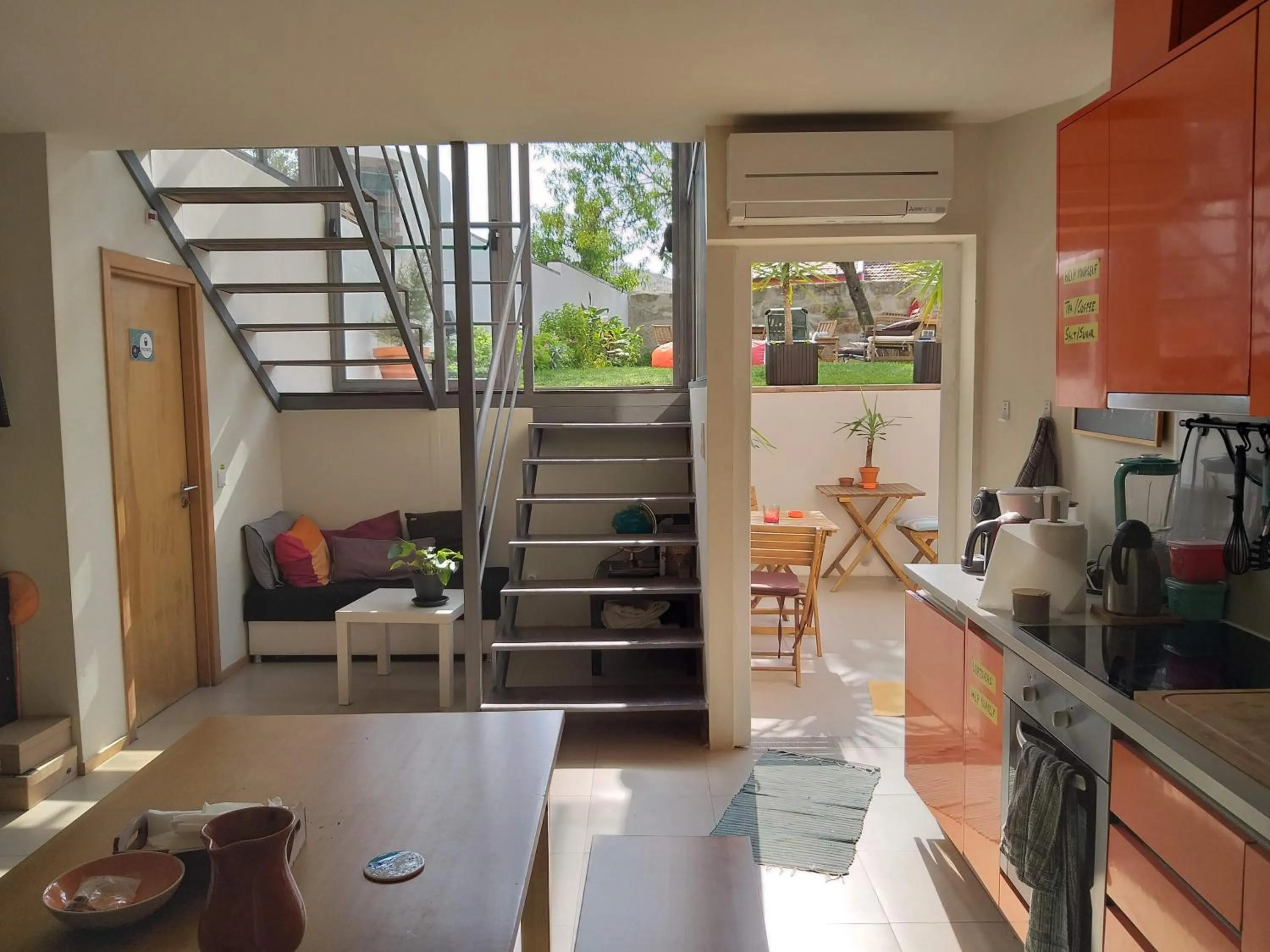 Communal lounge/ TV room in Peach Hostel & Suites