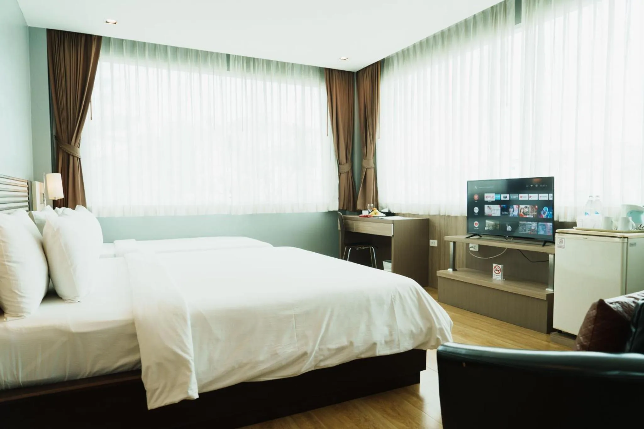 Bed in Green Hotel and Resort