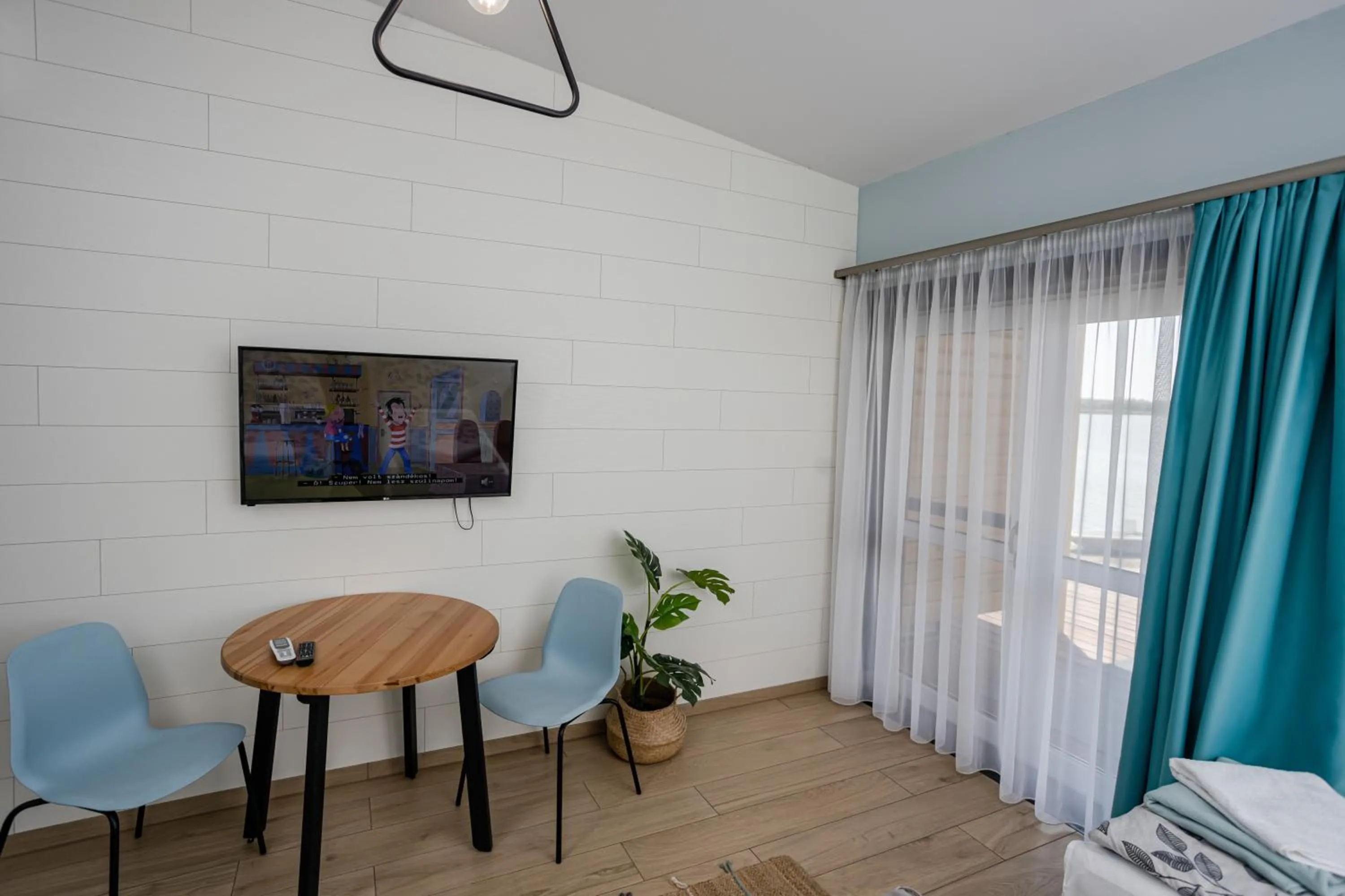 Photo of the whole room in Halfarock Vízi-Erdei Apartmanház