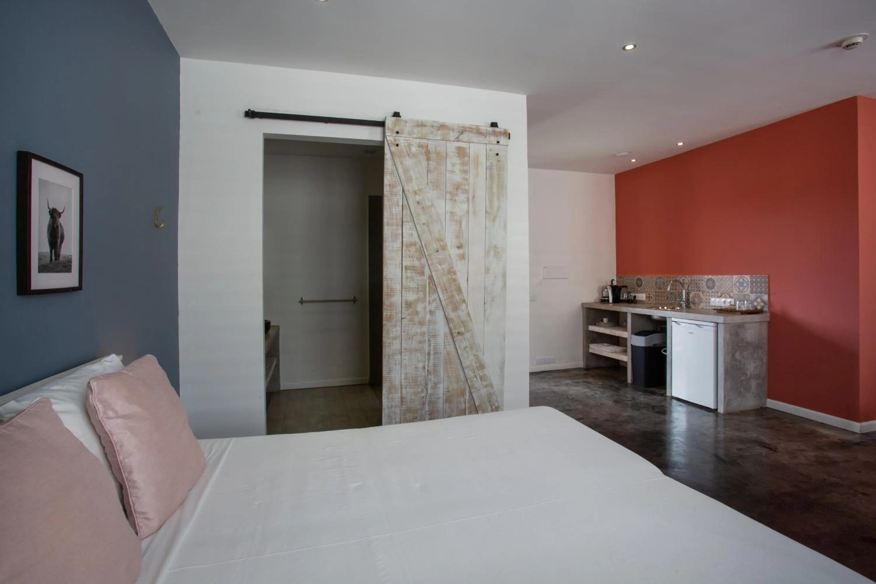 Bed in BOHO Bohemian Boutique Hotel