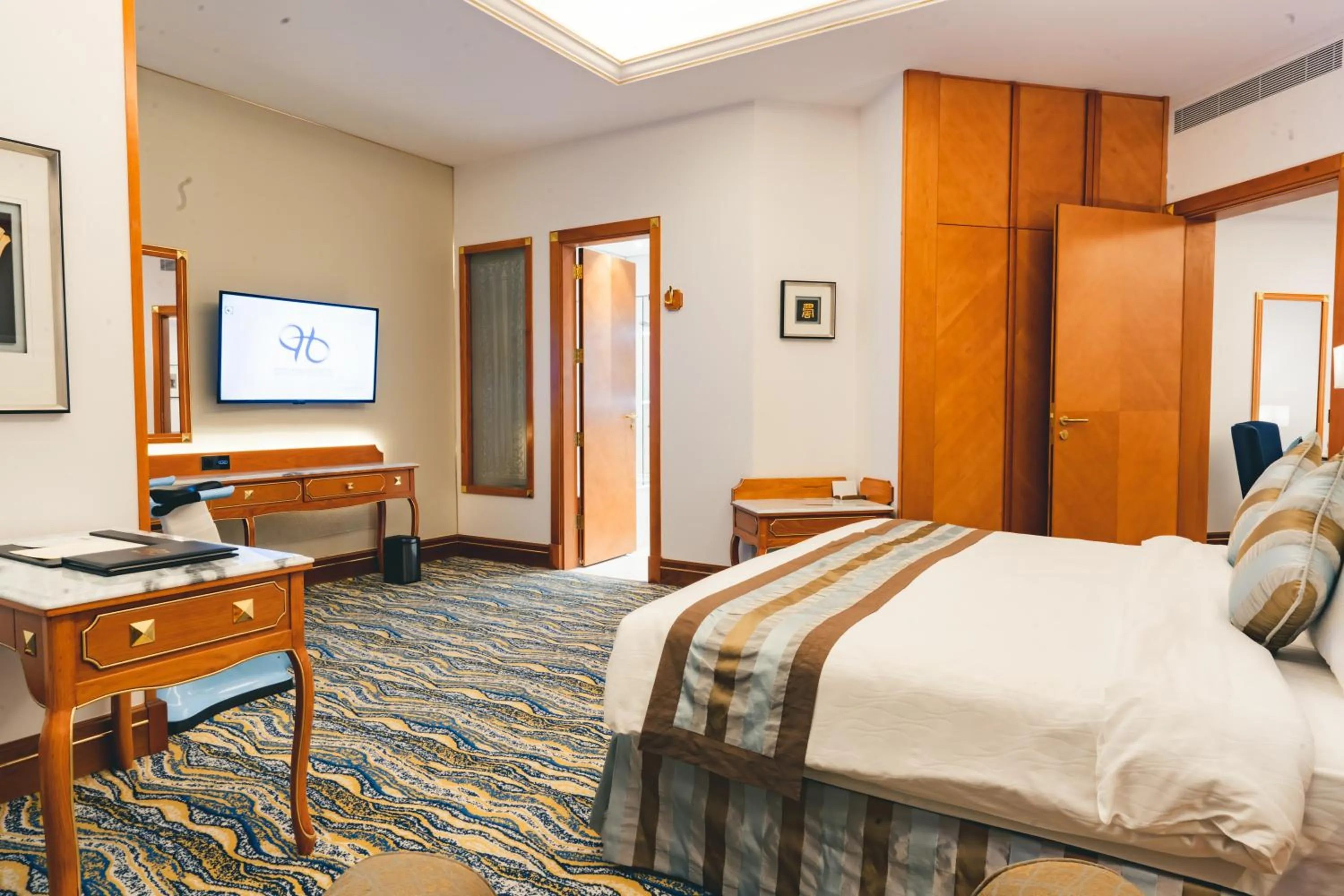 Bed in Iridium Hotel