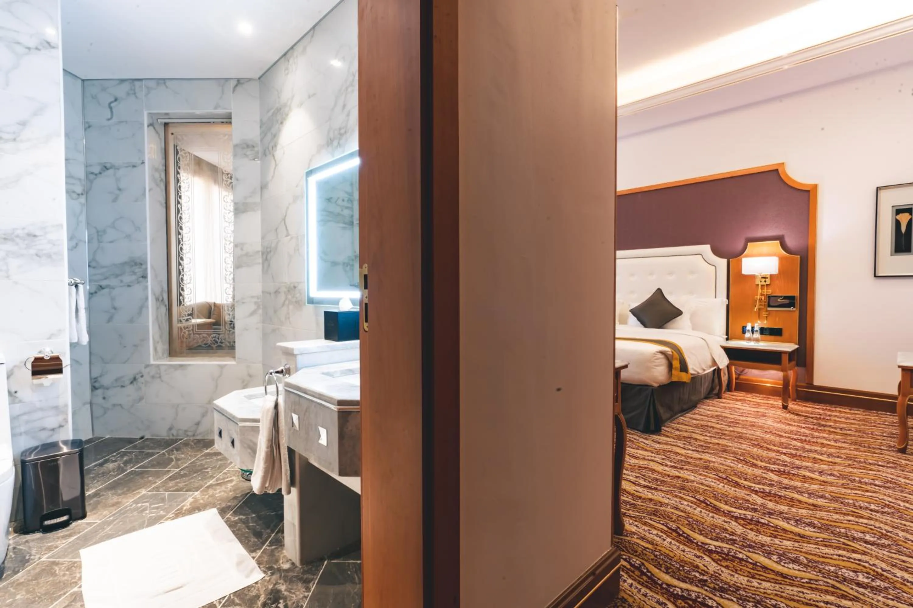 Bed in Iridium Hotel