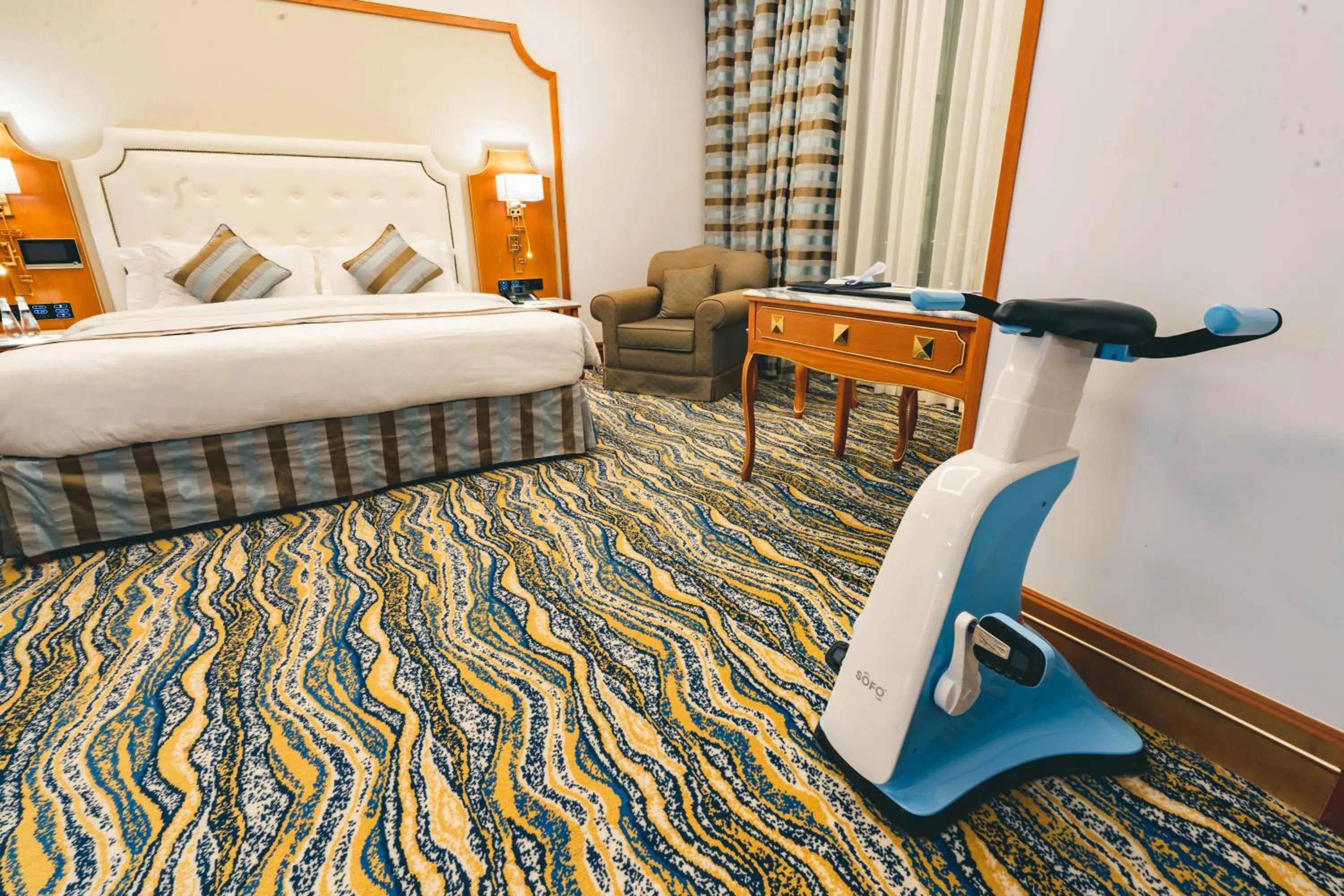 Bed in Iridium Hotel