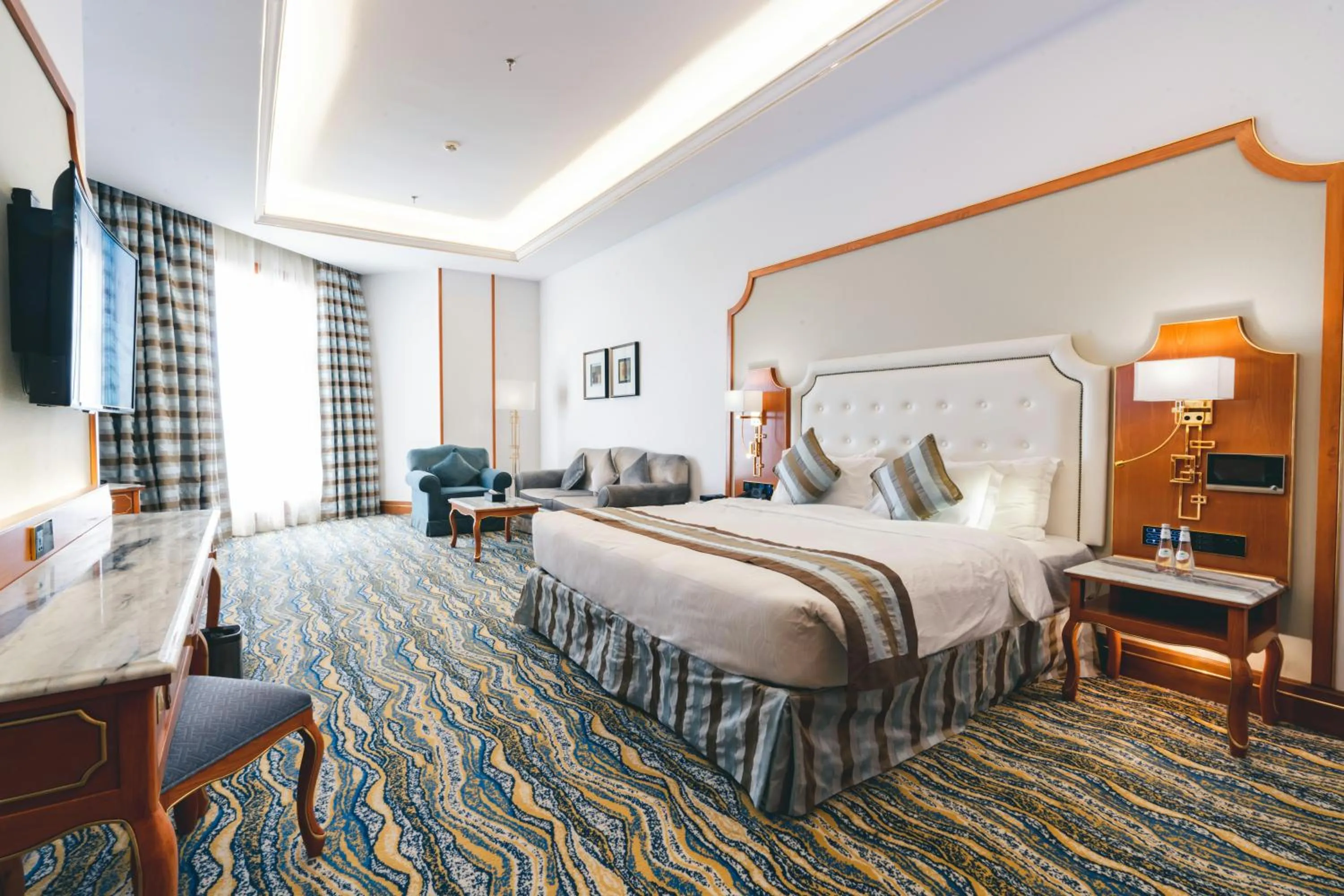 Bed in Iridium Hotel