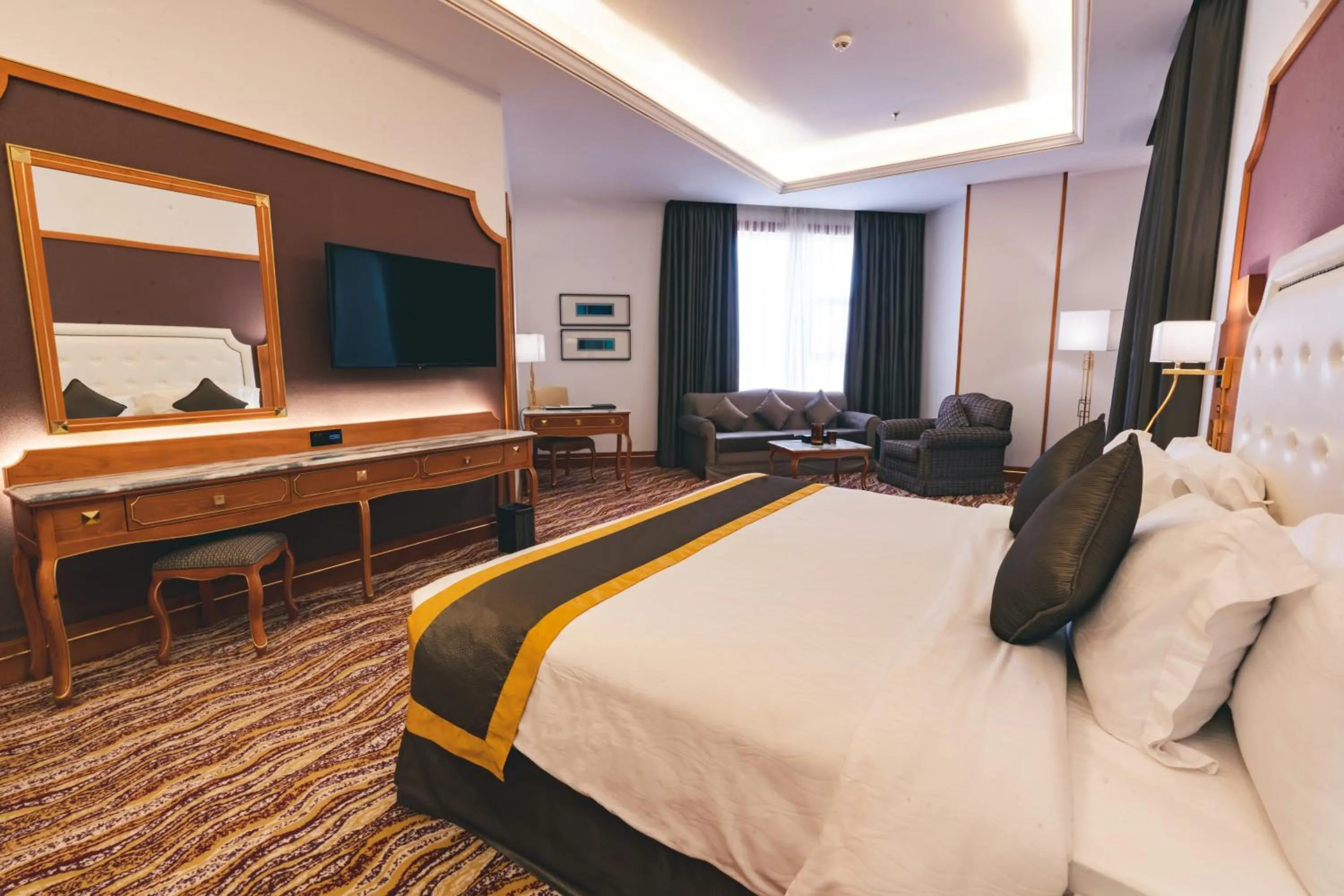 Bed in Iridium Hotel