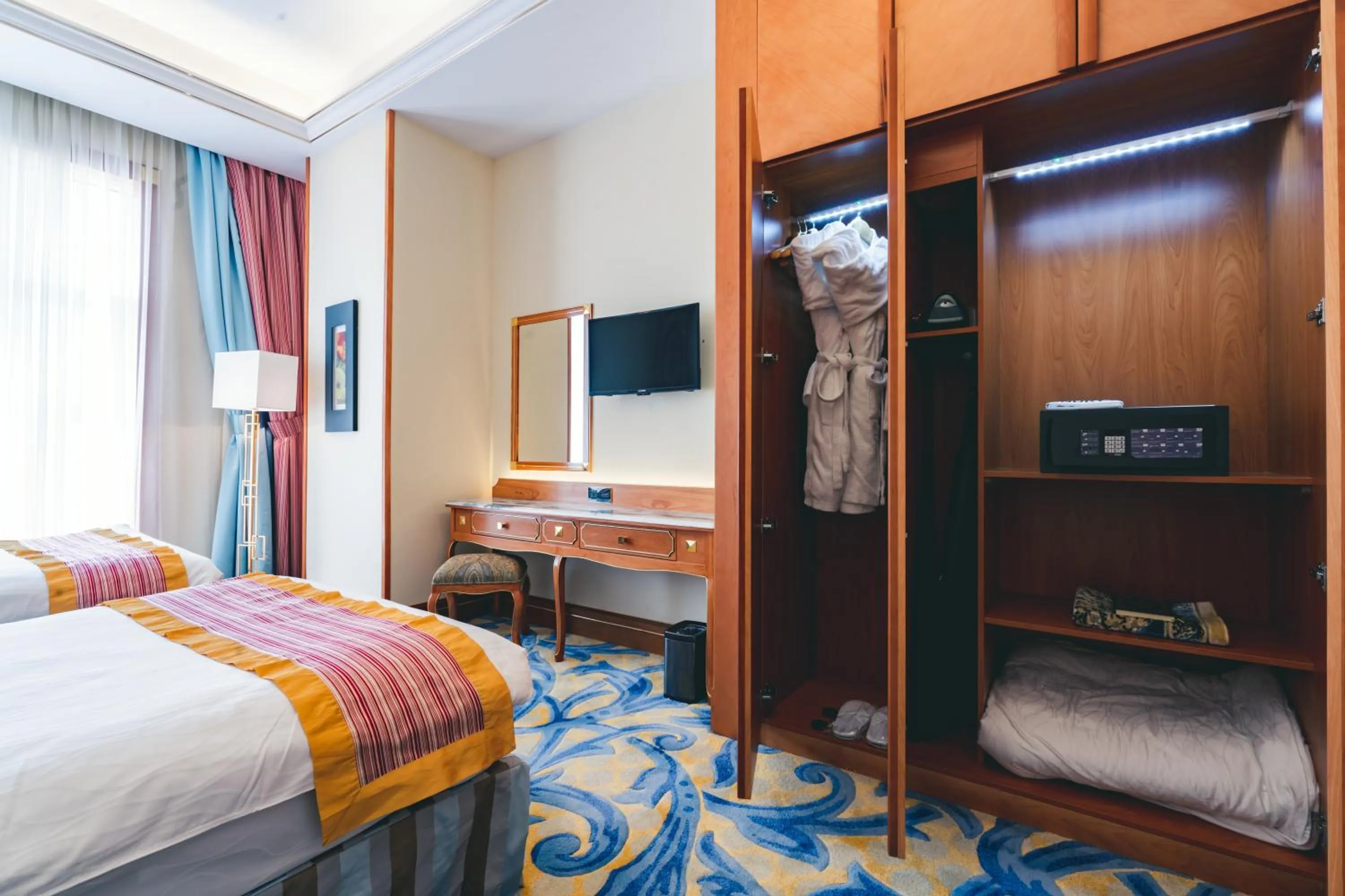 Bed in Iridium Hotel