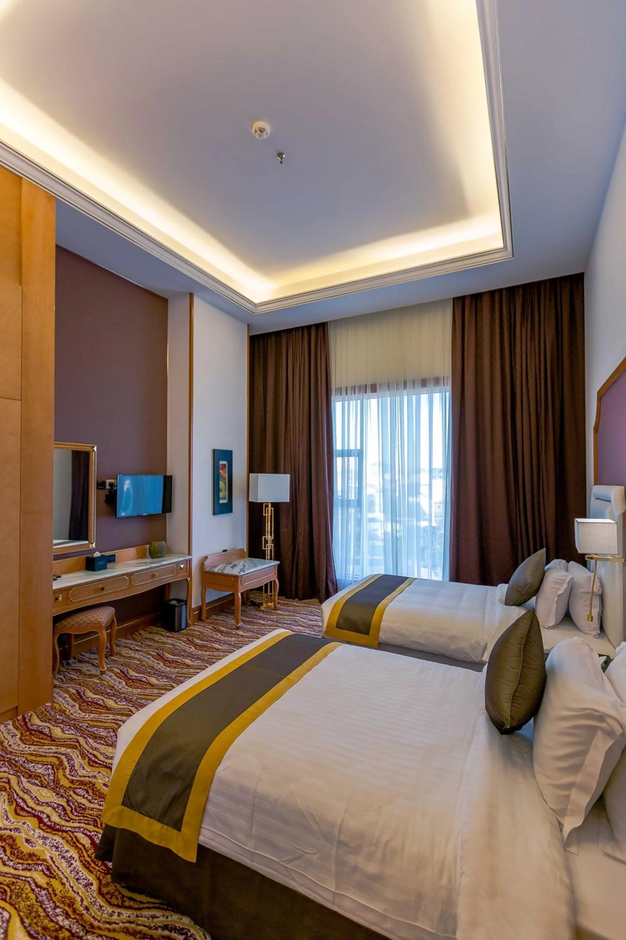 Bed in Iridium Hotel