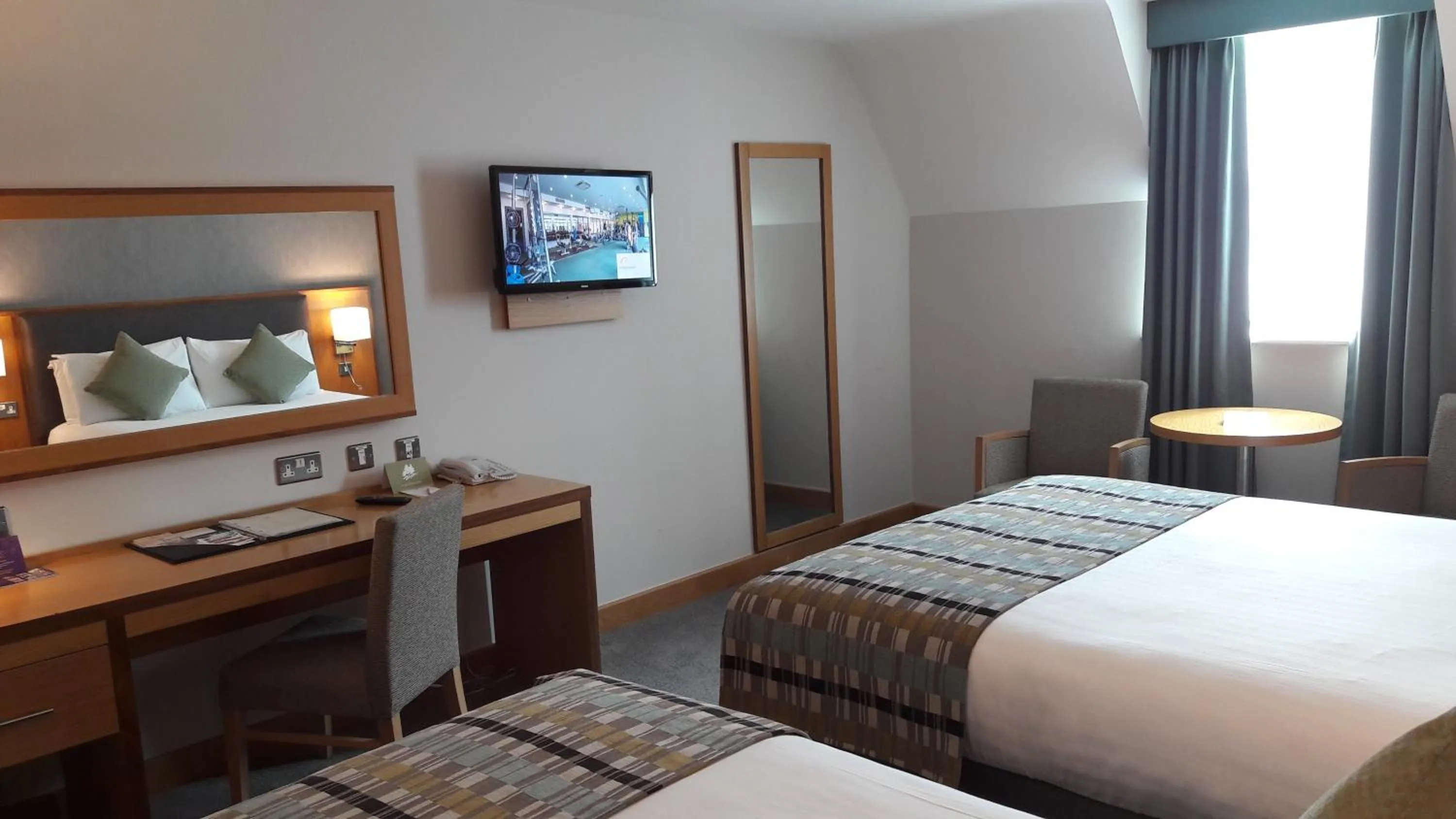 Seating area, Bed in Westgrove Hotel