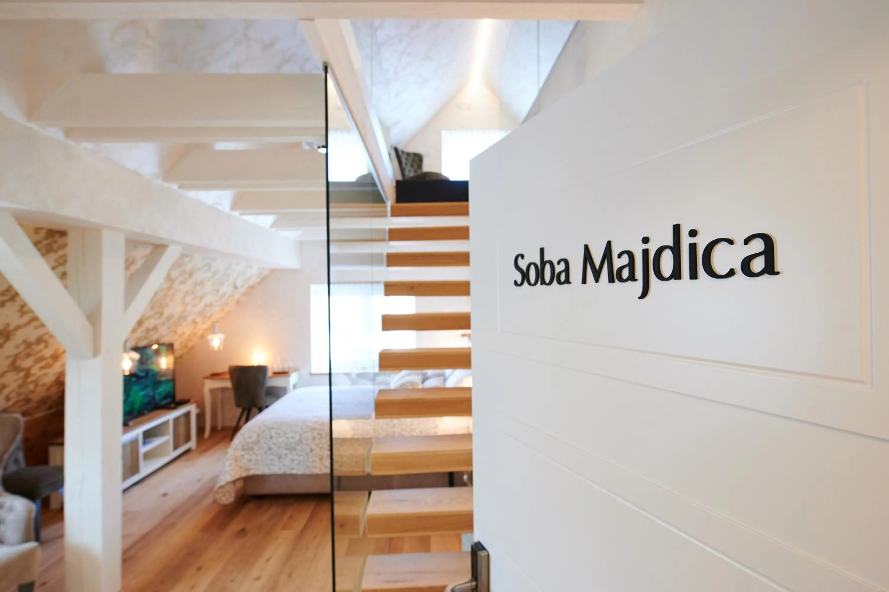 Property logo or sign, Bed in Hiša Ančka, Boutique Hotel & Maja Rooms